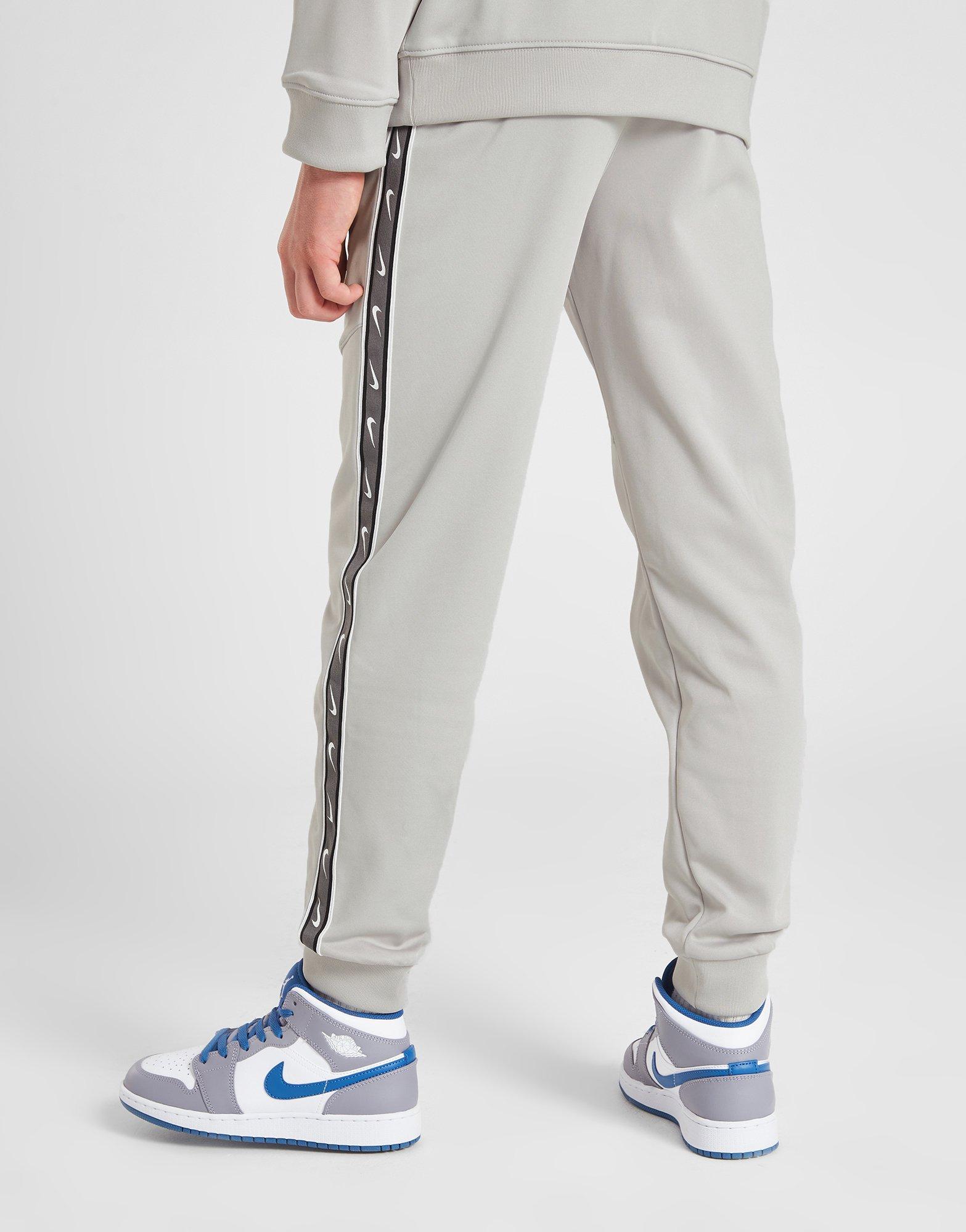Vaikiškos kelnės NIKE KELNĖS B NSW REPEAT SW PK JOGGER B DZ5623-012 Pilka