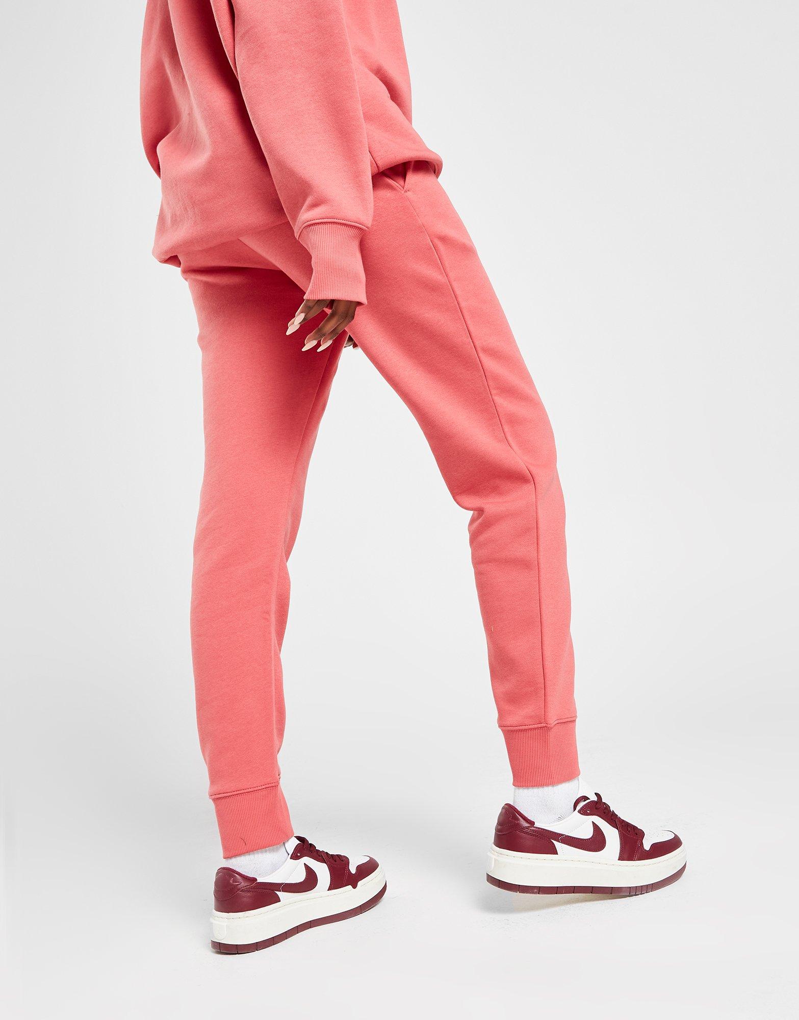 Moteriškos kelnės NIKE KELNĖS MIDI SWSH JOG ADOBE PANTS FD0893-655 Rožinė