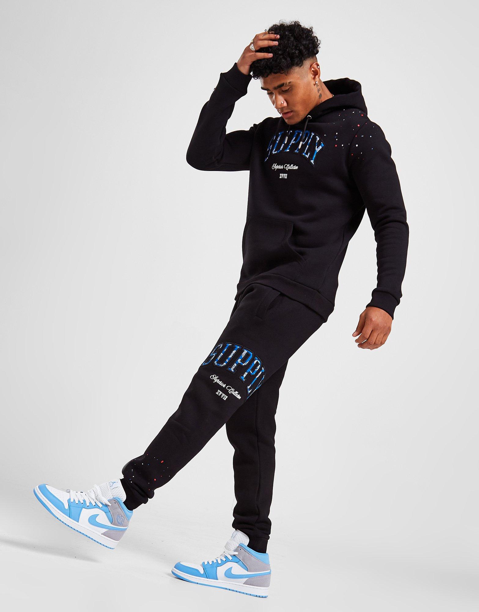 Vyriškos kelnės SUPPLY&DEMAND KELNĖS TEAM SPLATTER JOG PANTS BLAC SUPTM16369 Juoda