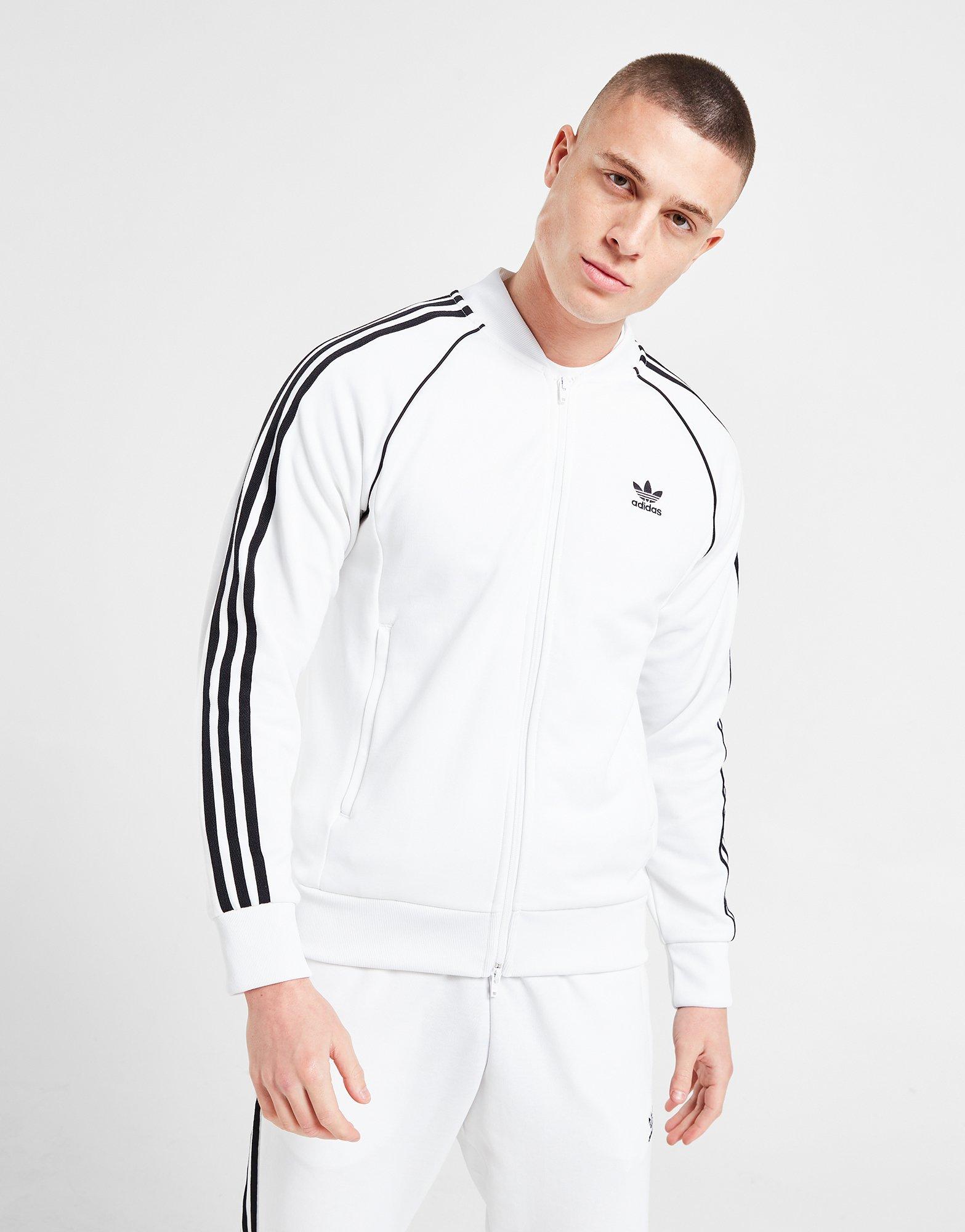 Bluza męska ADIDAS BLUZA Z KAPTUREM SST TRACKTOP PRIME BLUE IP7145 Biały