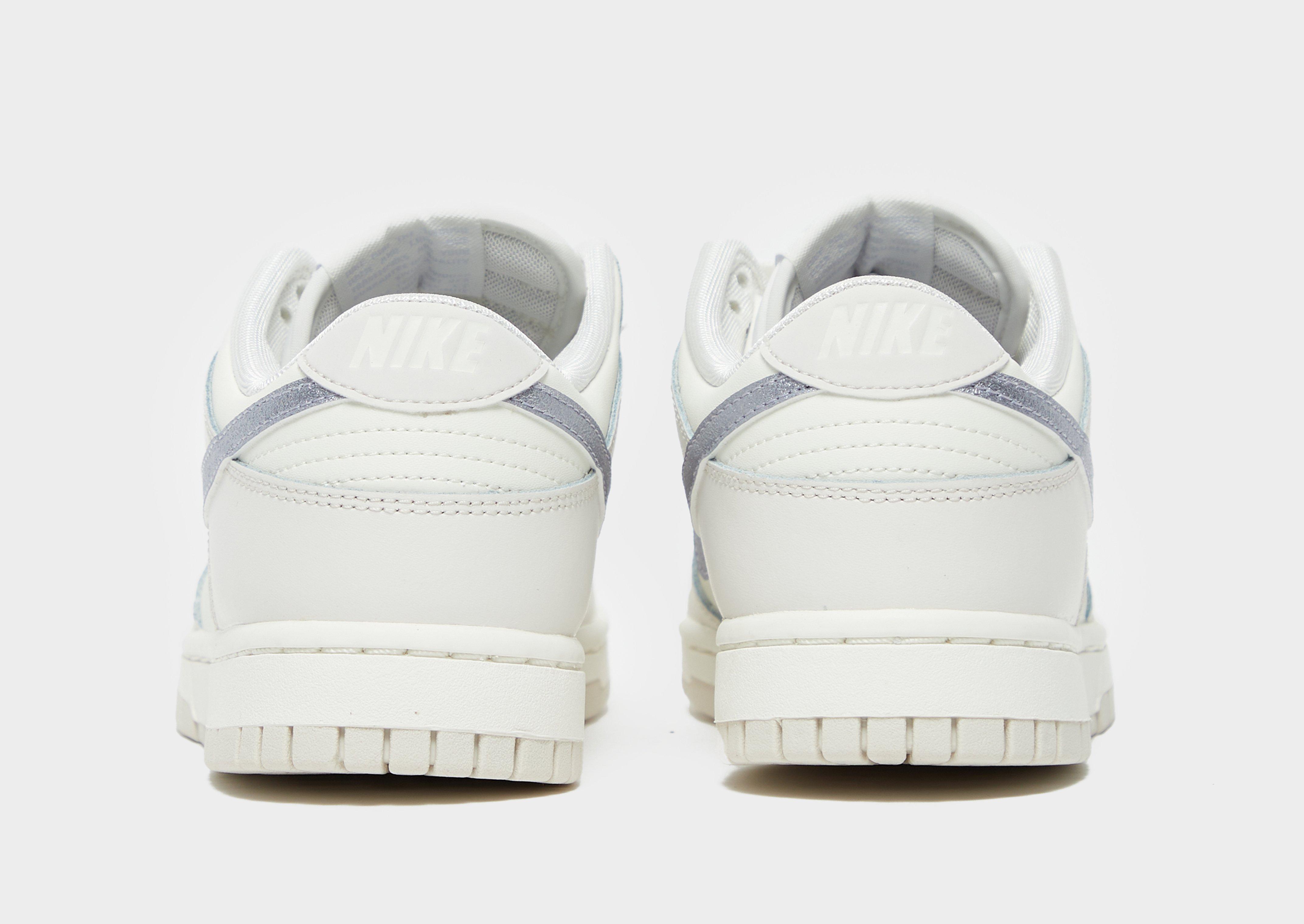 Dámske tenisky NIKE DUNK LOW ESS DX5930-100 Vícebarevná