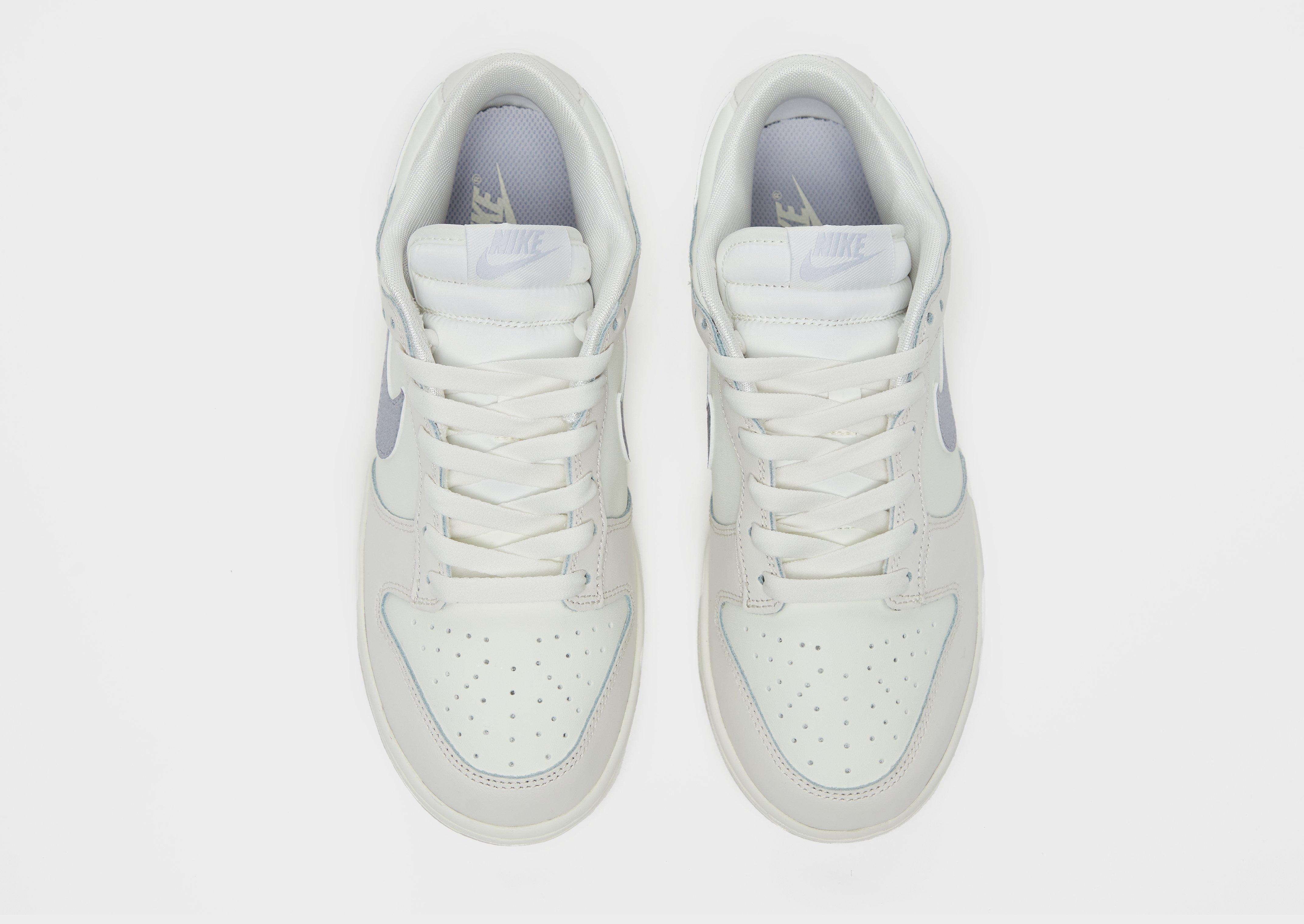 Dámske tenisky NIKE DUNK LOW ESS DX5930-100 Vícebarevná