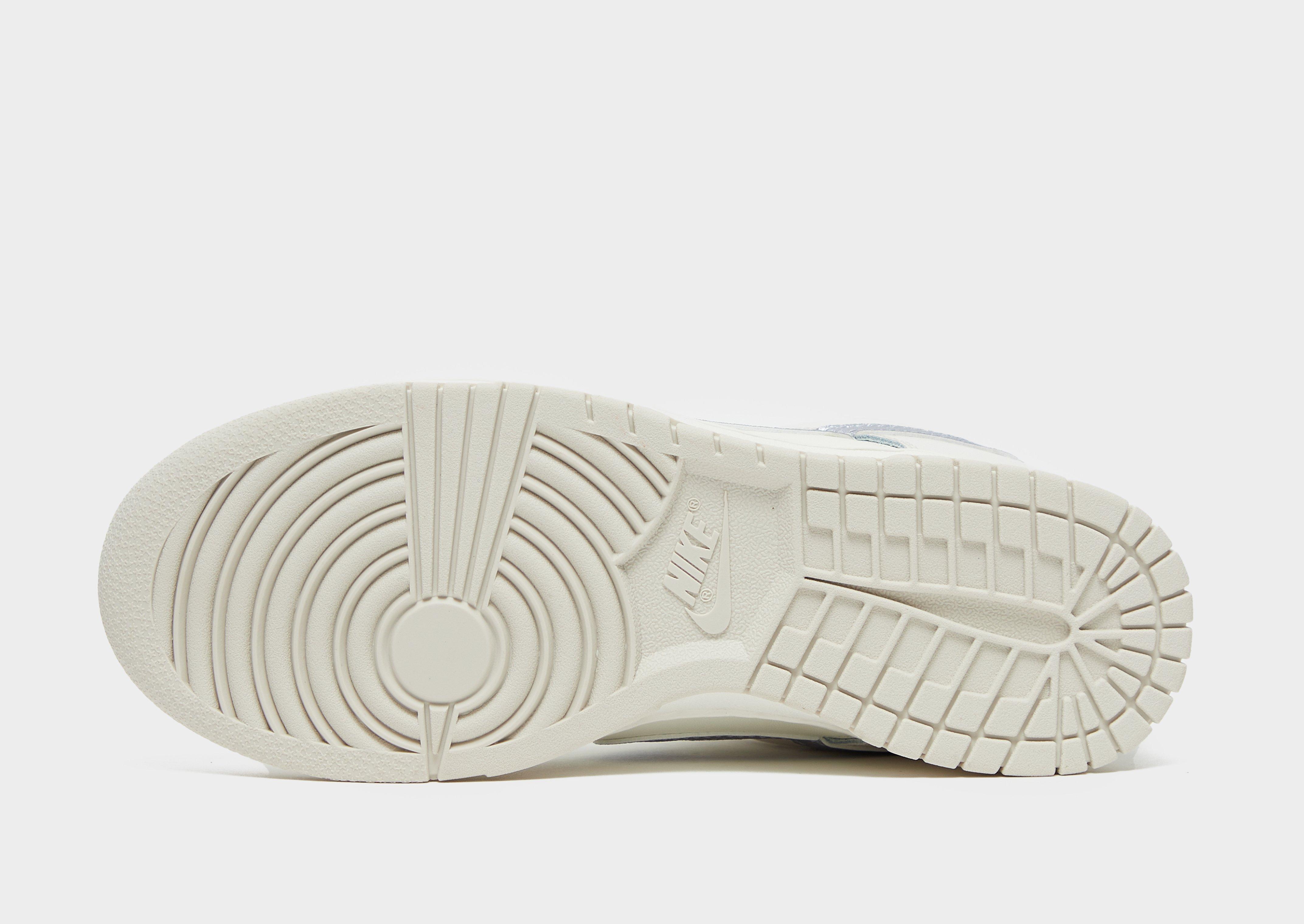 Dámske tenisky NIKE DUNK LOW ESS DX5930-100 Vícebarevná