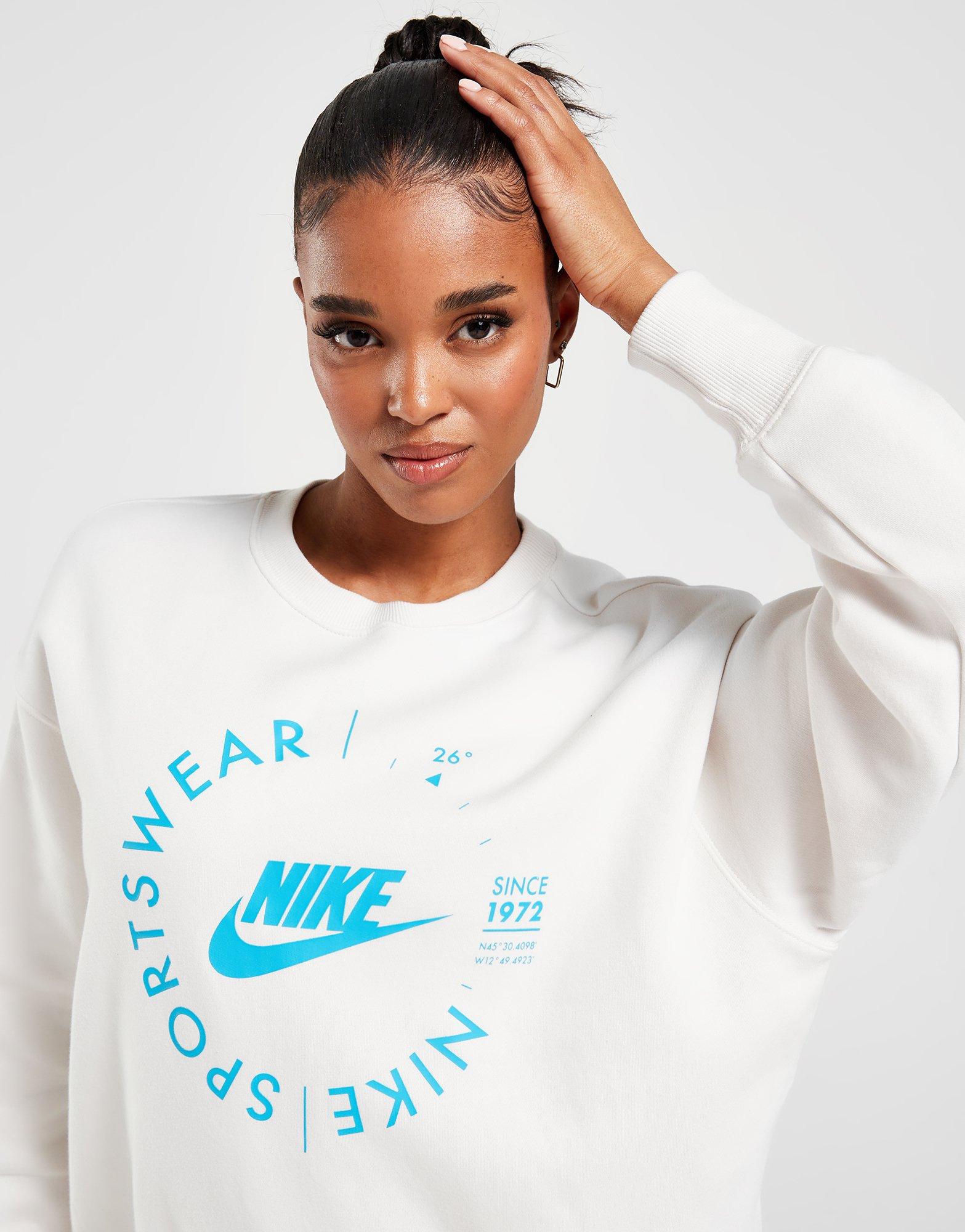 Moteriškas džemperis NIKE DŽEMPERIS W NSW FLC OS CREW PRNT SU SWEATSHIRT FD4234-030 Rusva