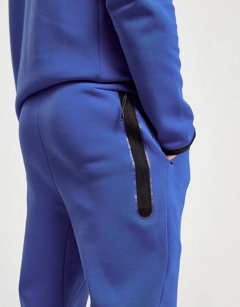 NIKE SPODNIE M NSW TCH FLC JGGR S PANTS DV0538-480 Niebieski