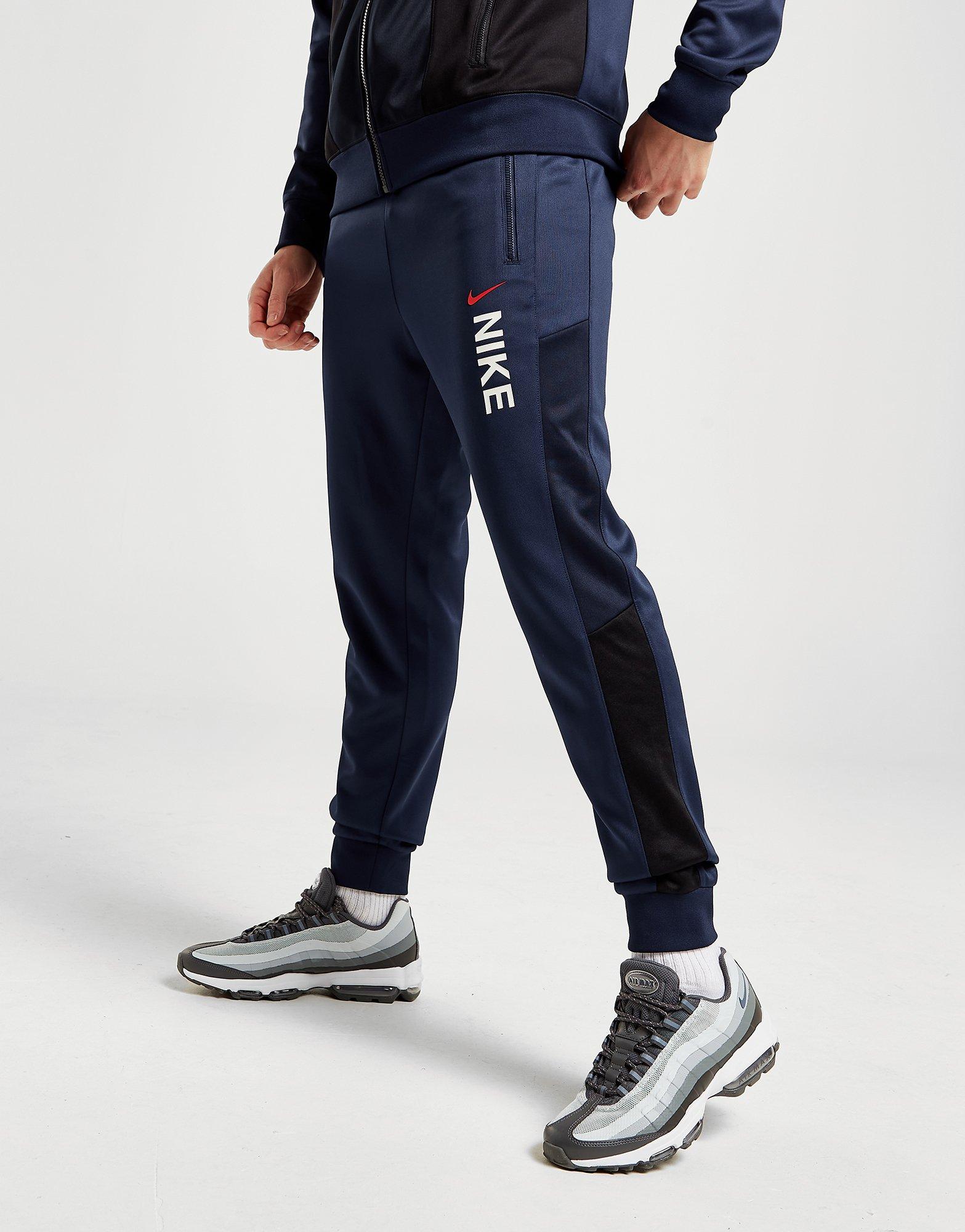 Pantaloni pentru bărbați NIKE PANTALONI  HYBRID PK TP NAVY PANTS FB1434-410 Albastru