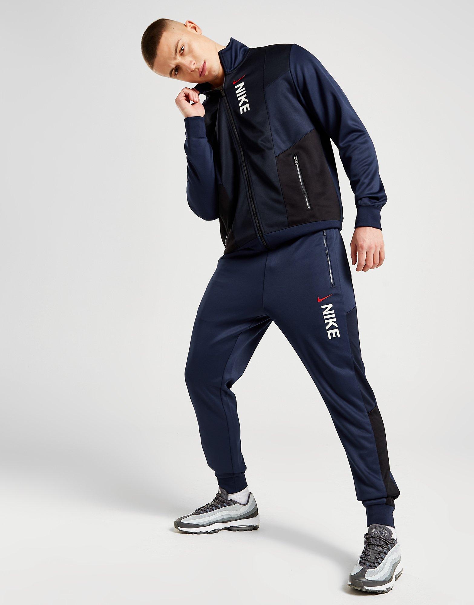 Pantaloni pentru bărbați NIKE PANTALONI  HYBRID PK TP NAVY PANTS FB1434-410 Albastru