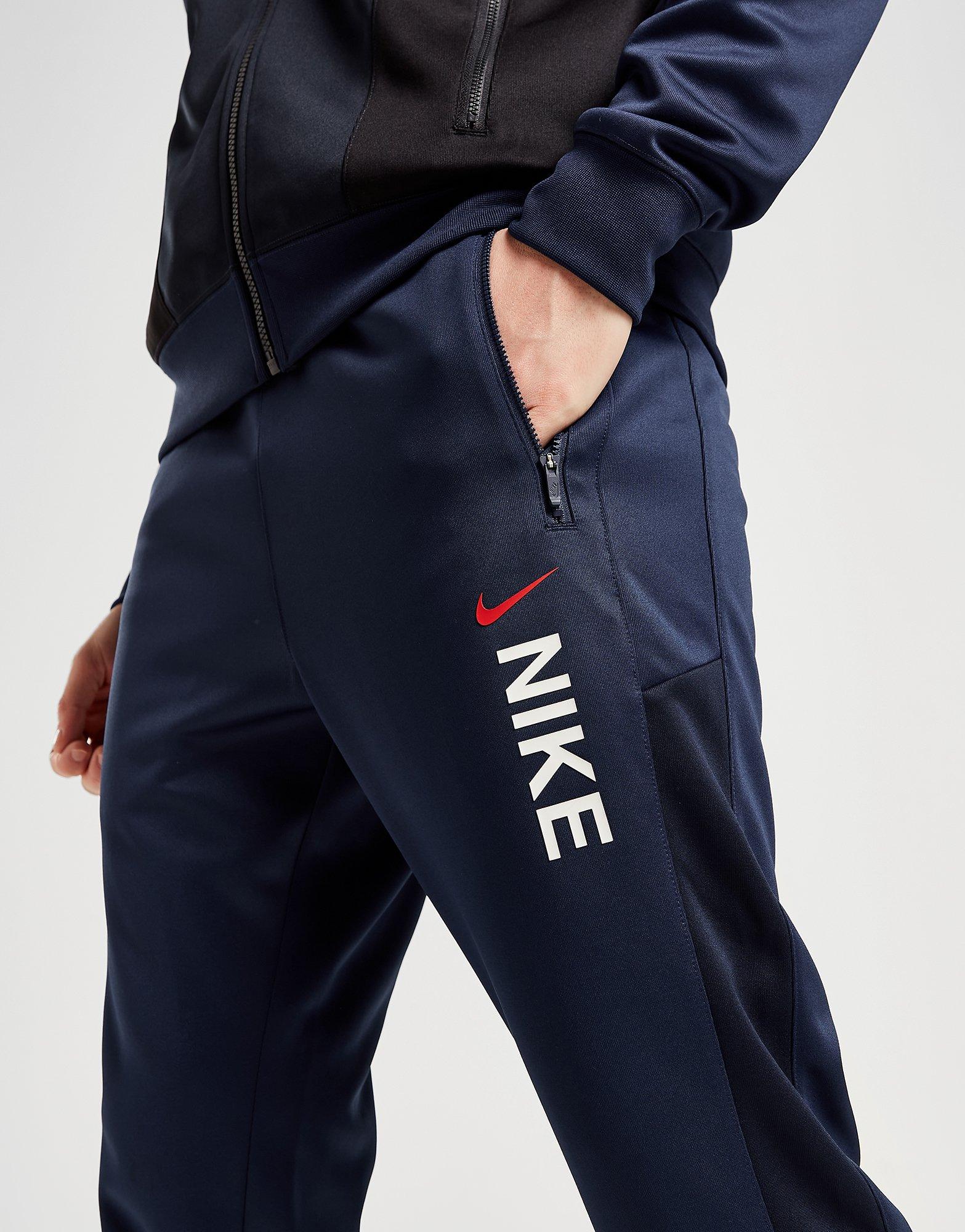 Pantaloni pentru bărbați NIKE PANTALONI  HYBRID PK TP NAVY PANTS FB1434-410 Albastru