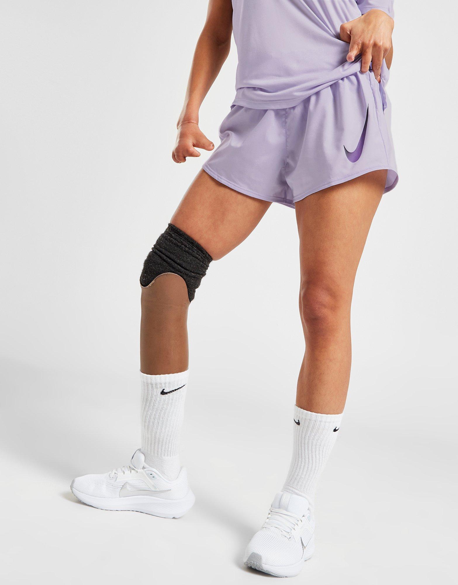 Дамски шорти NIKE ШОРТИ W NK SWOOSH SHORT VENEER VERS SHORTS DX1031-536 Лилав