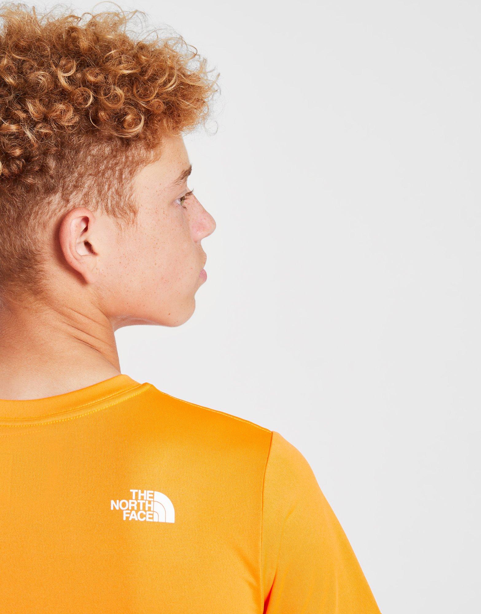 Gyerek póló THE NORTH FACE PÓLÓ REAXION T NF0A83HMBEH1 Narancssárga