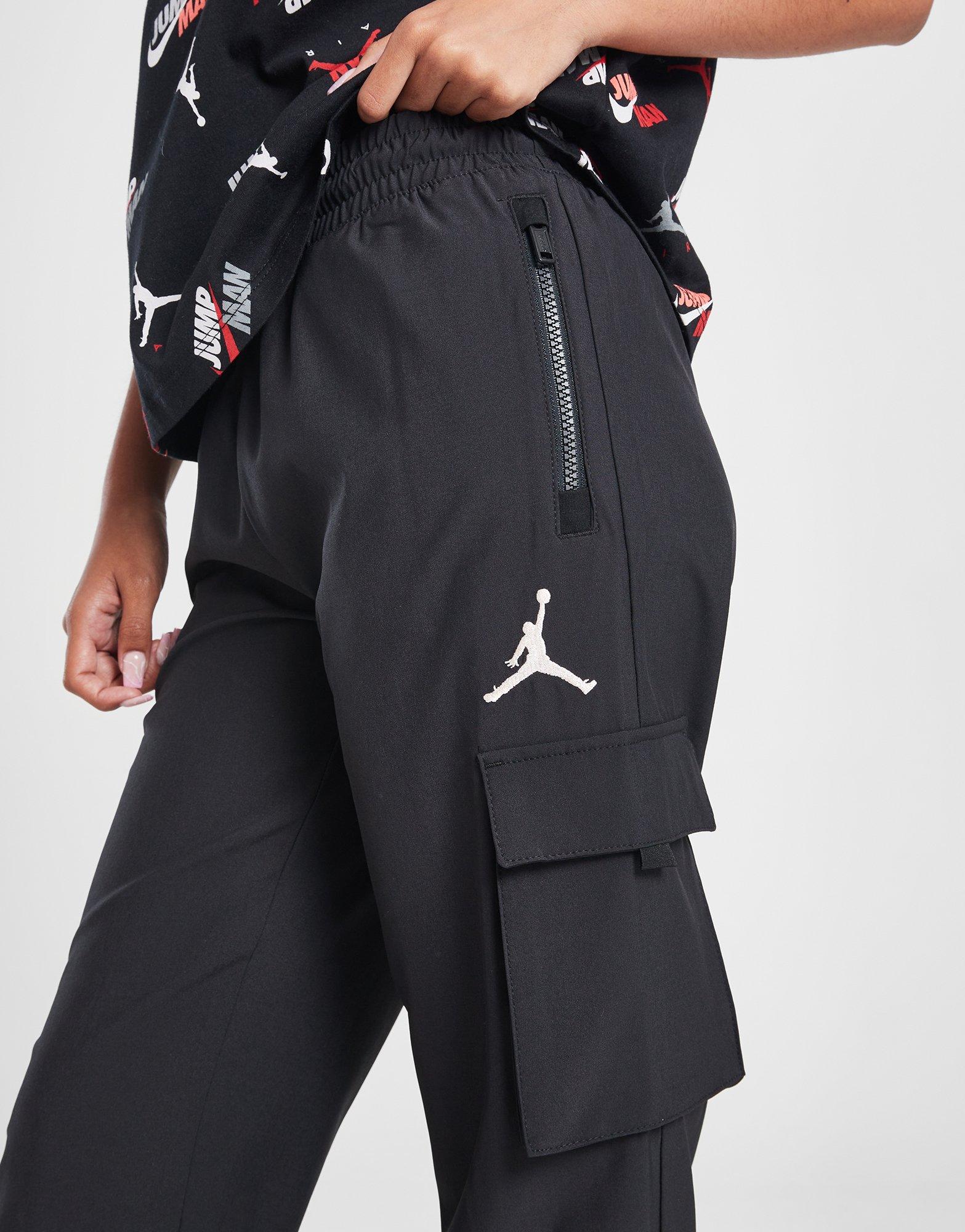 Dětské kalhoty JORDAN KALHOTY  JDG JORDAN POST UP CARGO G 45C654-023 Černá