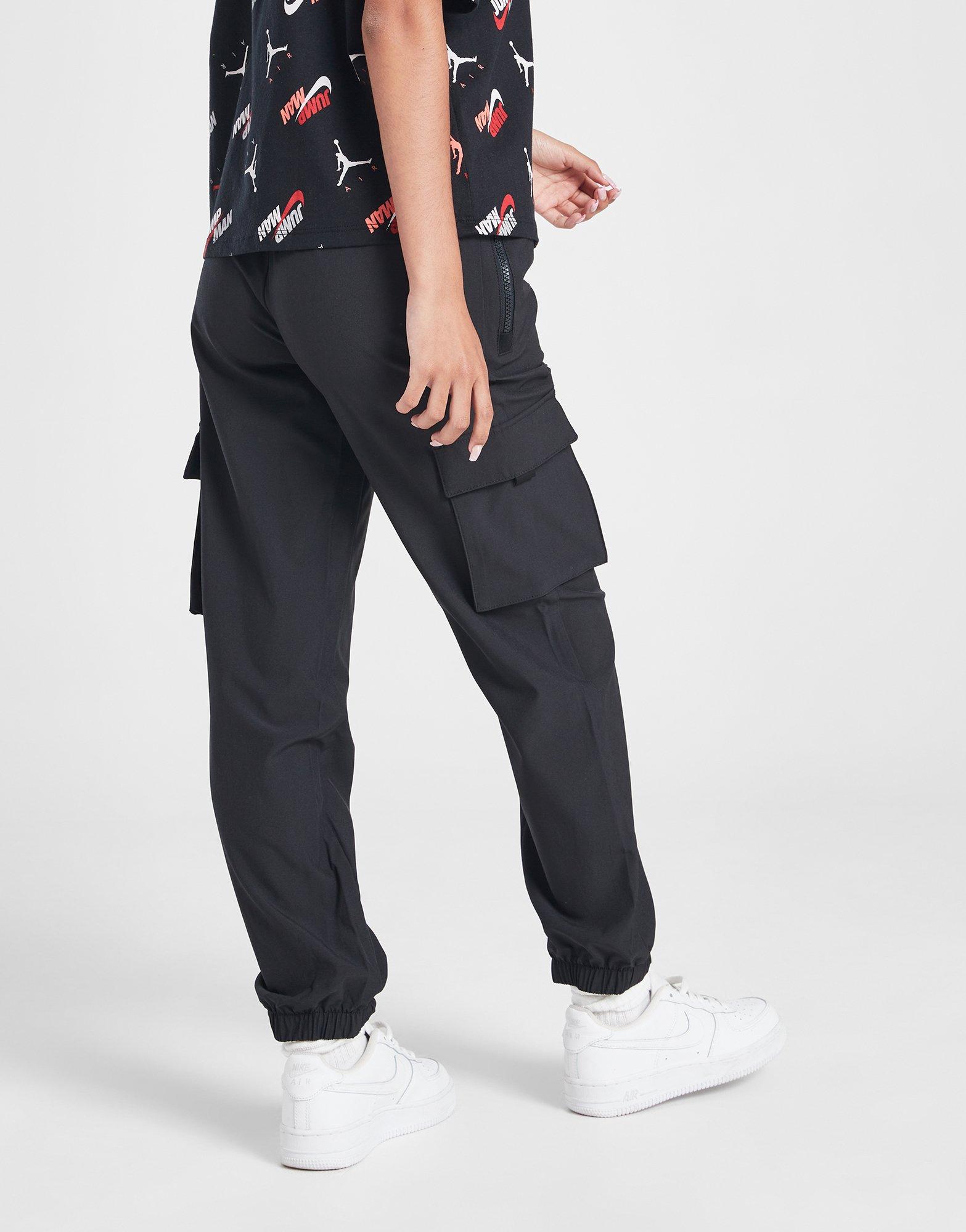 Dětské kalhoty JORDAN KALHOTY  JDG JORDAN POST UP CARGO G 45C654-023 Černá