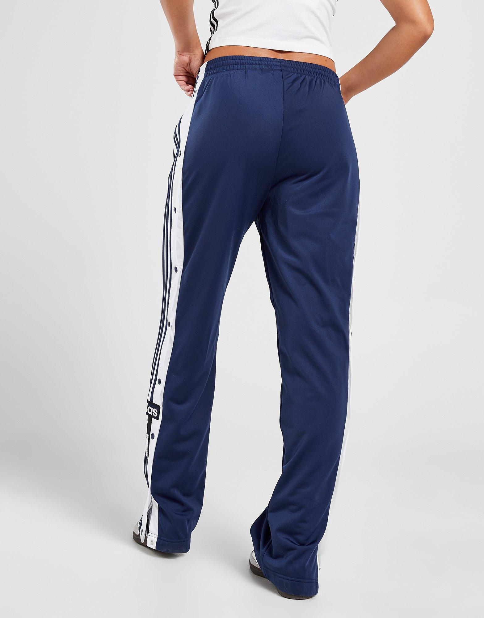 Pantaloni pentru femei ADIDAS PANTALONI  ADIBREAK TP IK3853 Bleumarin