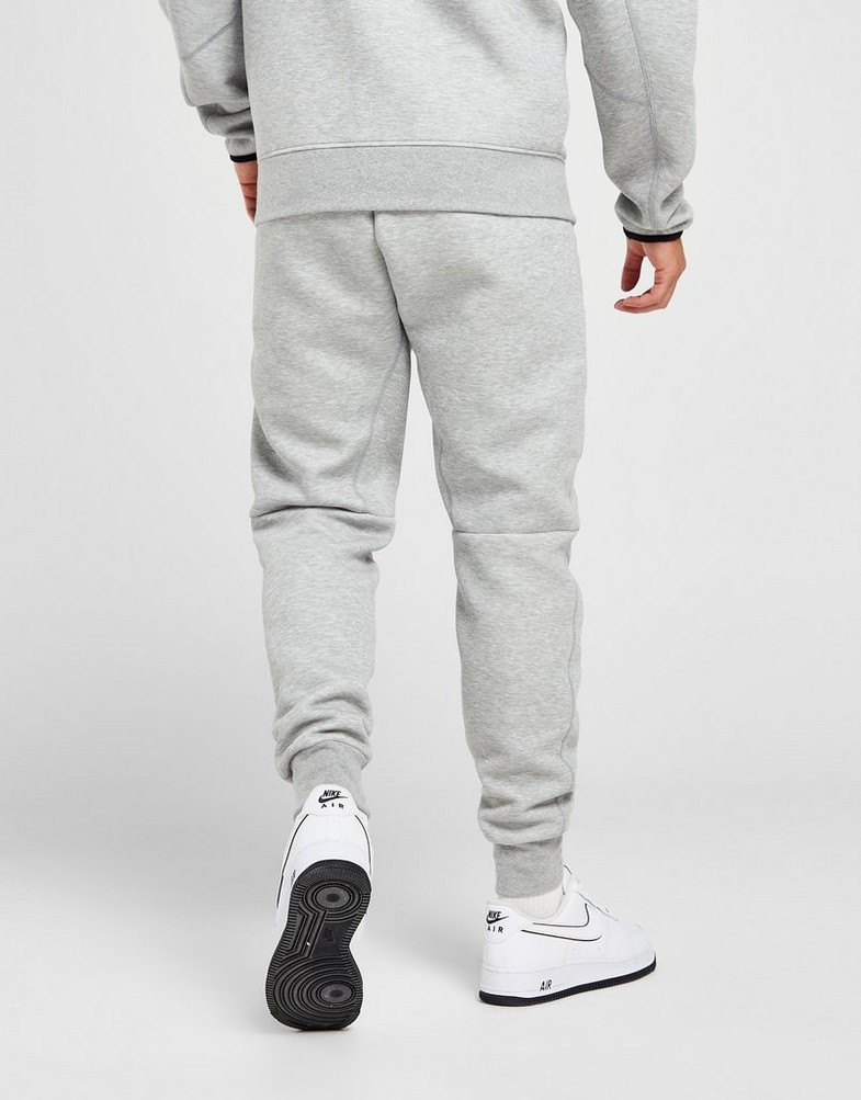 Чоловічі штани NIKE ШТАНИ M NK TCH FLC JGGR FB8002-063 Сірий