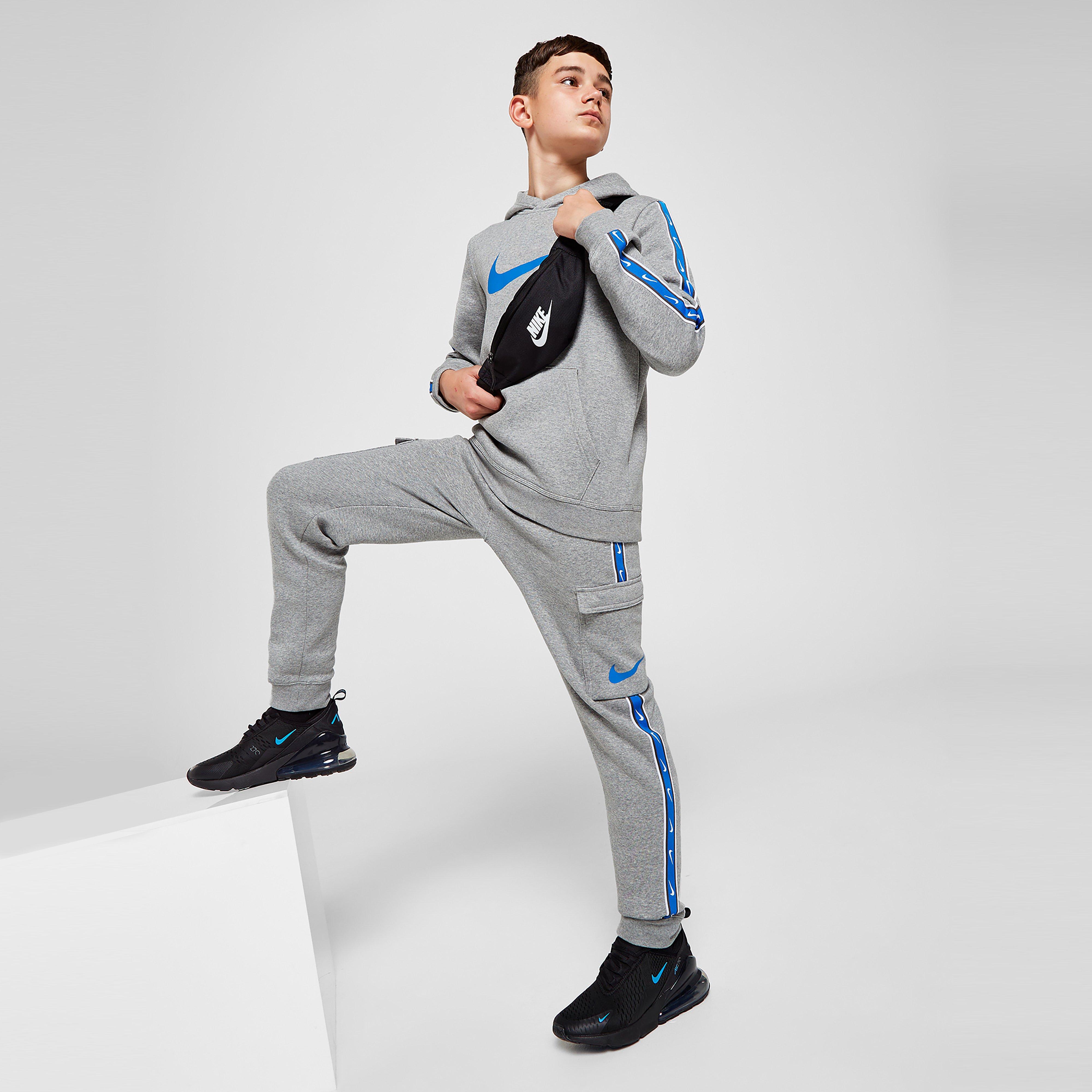 Pantaloni pentru copii NIKE PANTALONI  B NSW REPEAT SW FLC CARGO PANT