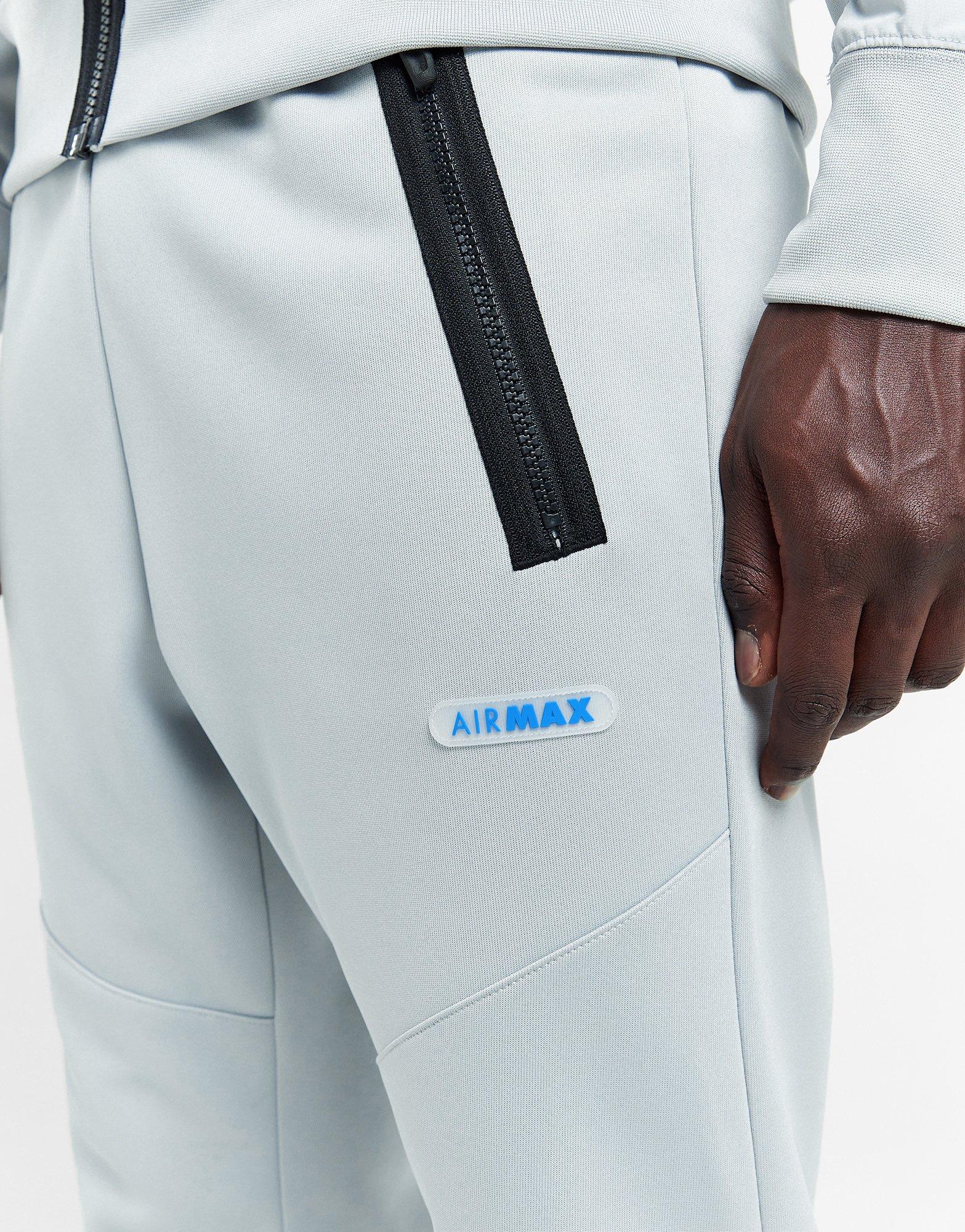 Pánské kalhoty NIKE KALHOTY  M NSW AIR MAX PK JOGGER FN0239-077 Šedá