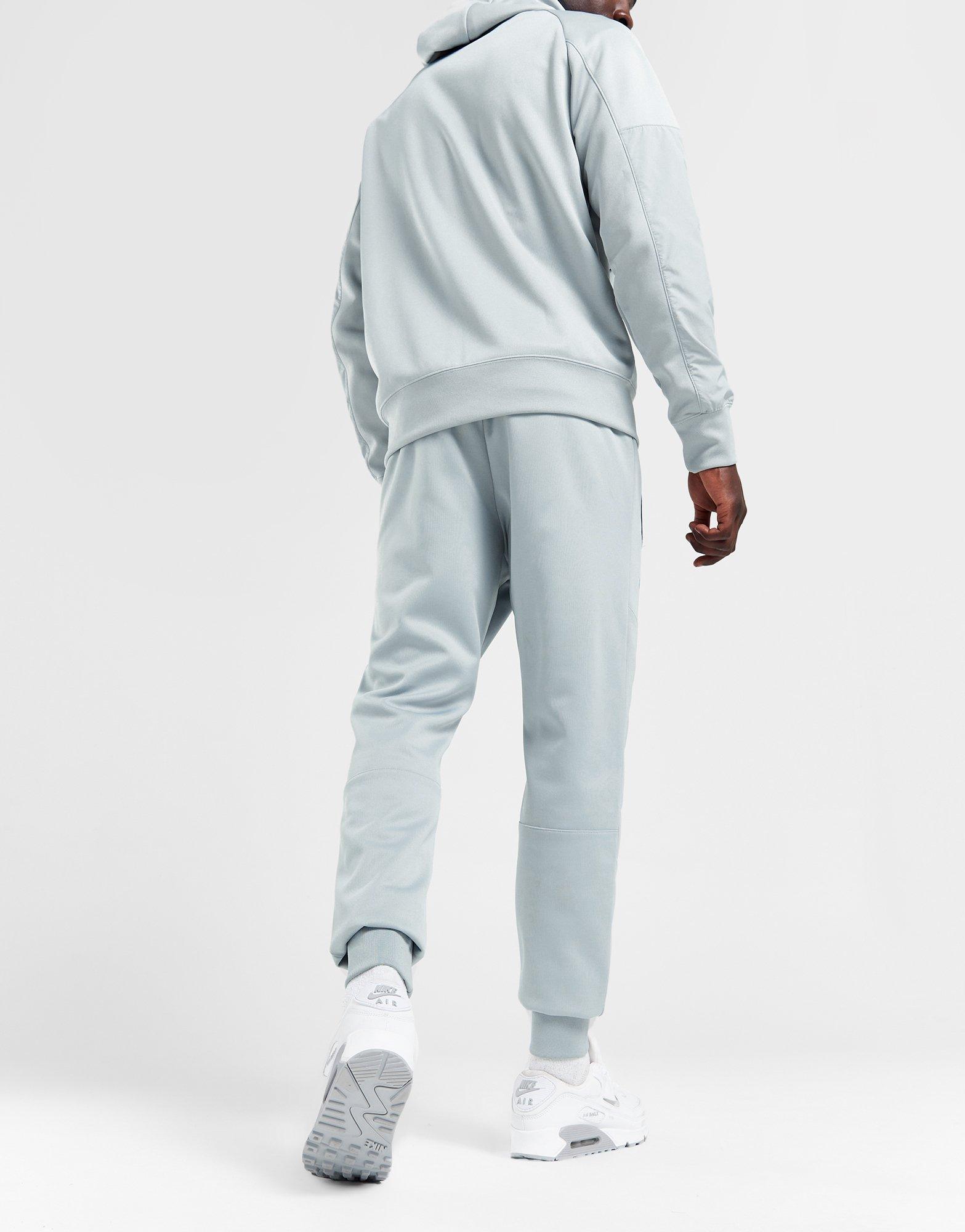 Pánské kalhoty NIKE KALHOTY  M NSW AIR MAX PK JOGGER FN0239-077 Šedá