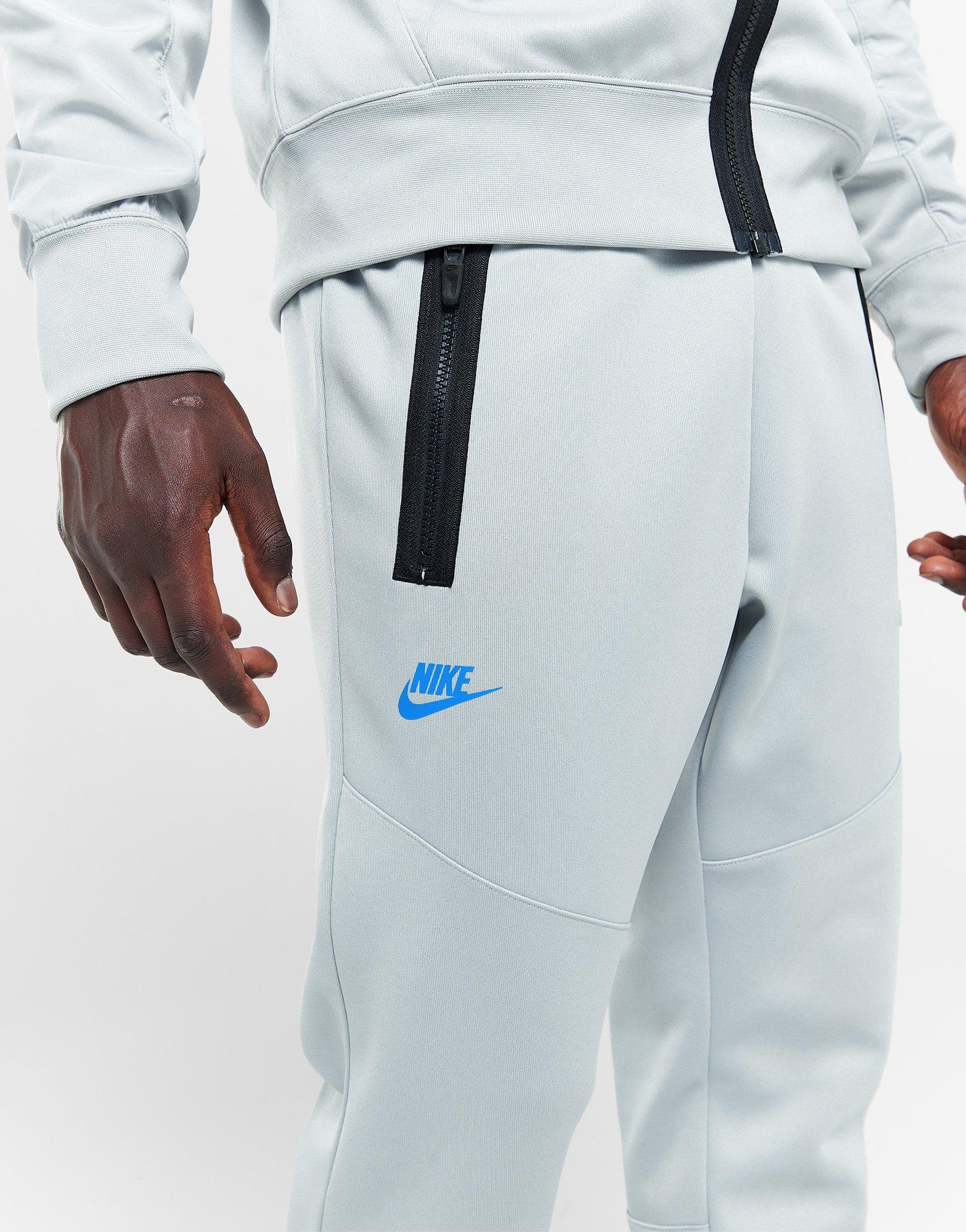 Pánské kalhoty NIKE KALHOTY  M NSW AIR MAX PK JOGGER FN0239-077 Šedá