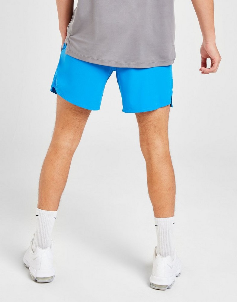 Krótkie spodenki, szorty męskie NIKE SZORTY M NSW AIR MAX TC ST WV SHORTS FB2493-406 Niebieski
