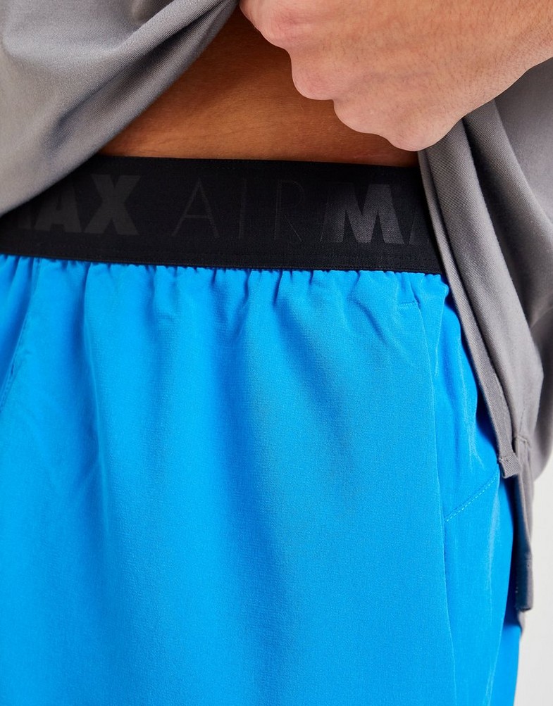 Krótkie spodenki, szorty męskie NIKE SZORTY M NSW AIR MAX TC ST WV SHORTS FB2493-406 Niebieski