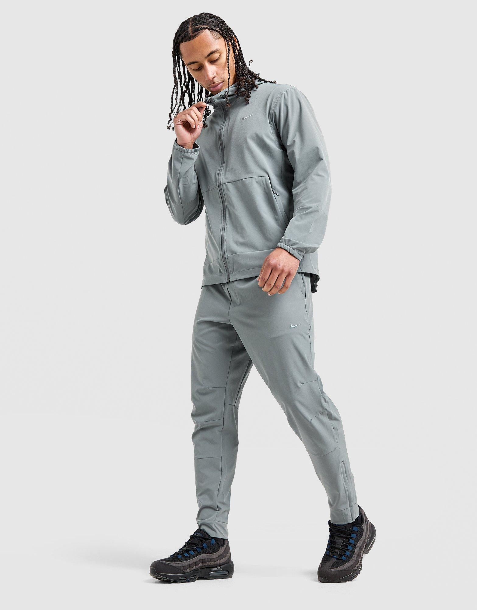 Nike Nadrág M Nk Df Unlimited Pant Tpr