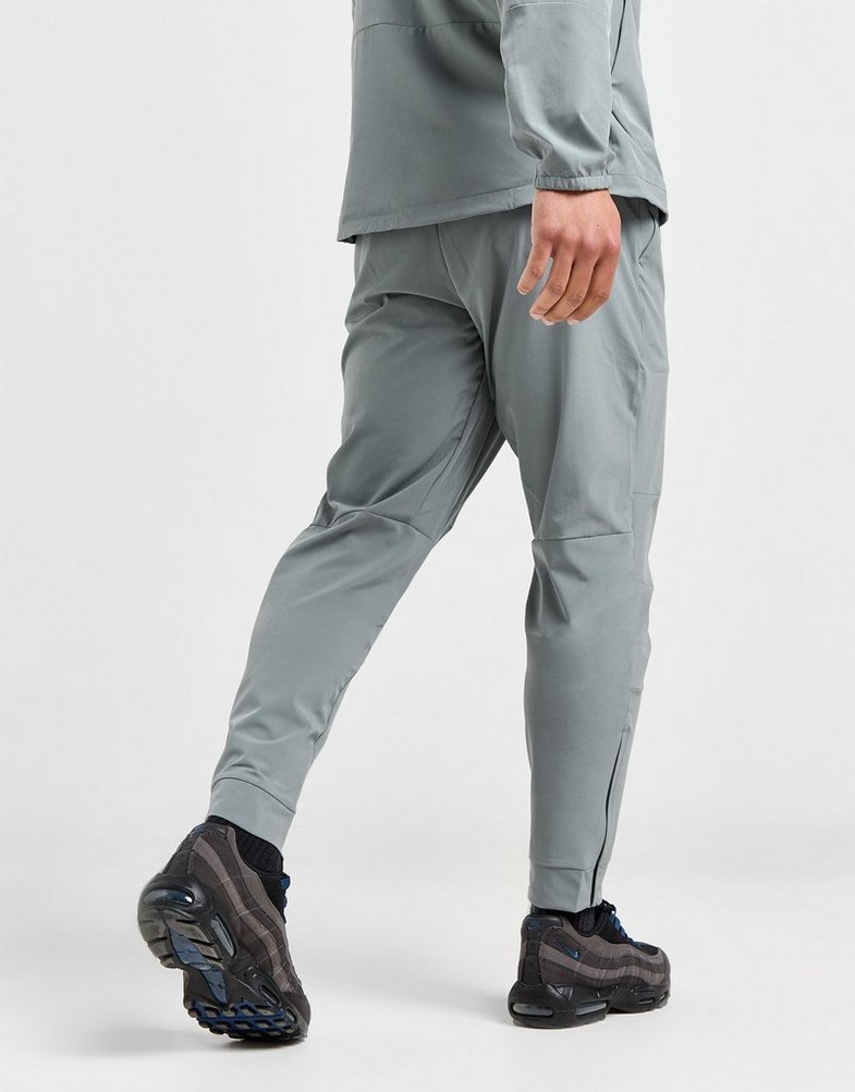Чоловічі штани NIKE ШТАНИ M NK DF UNLIMITED PANT TPR FB7548-084 Сірий