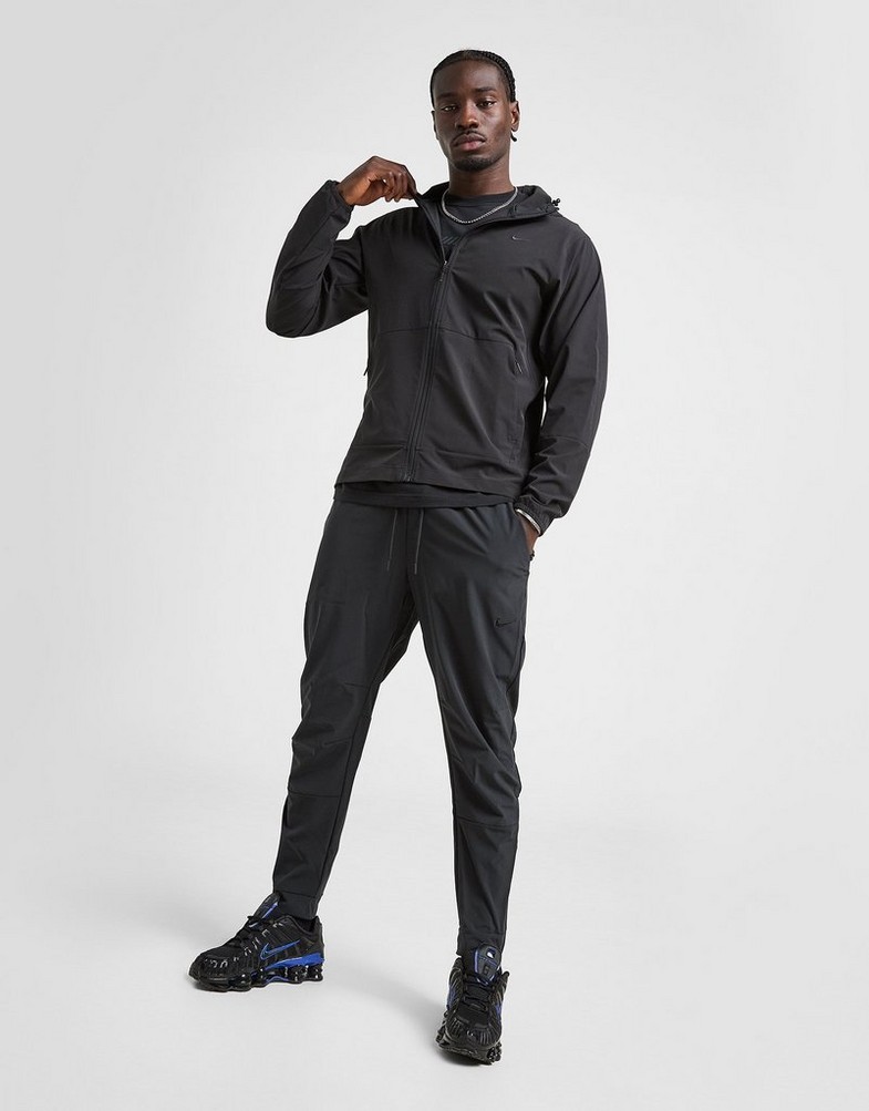 NIKE NADRÁG M NK DF UNLIMITED PANT TPR FB7548-010 Fekete