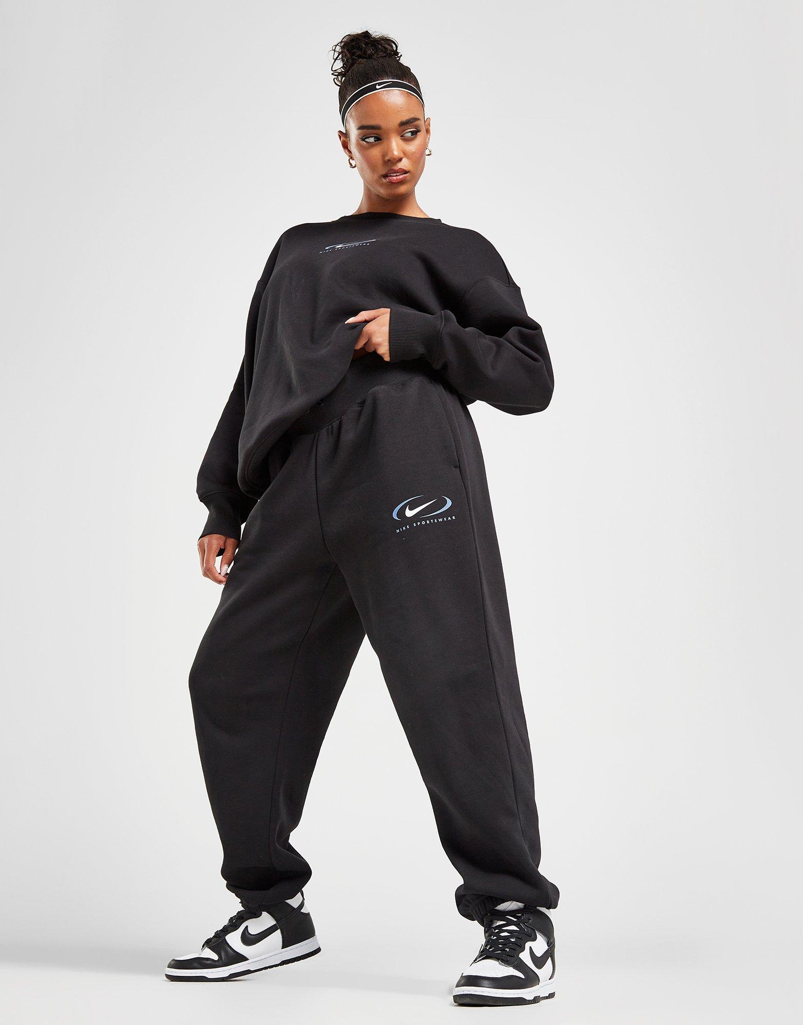 NIKE KELNĖS W NSW PHNX FLC HR OS PANT PRNT FN7716-010