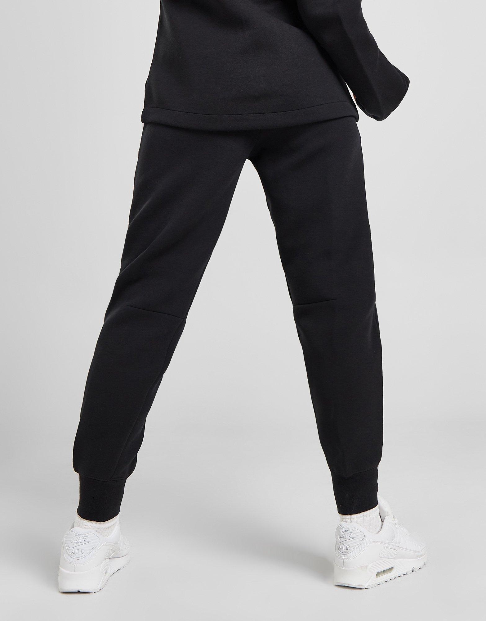 Pantaloni pentru femei NIKE PANTALONI  W NSW TCH FLC MR JGGR FB8330-010 Negru