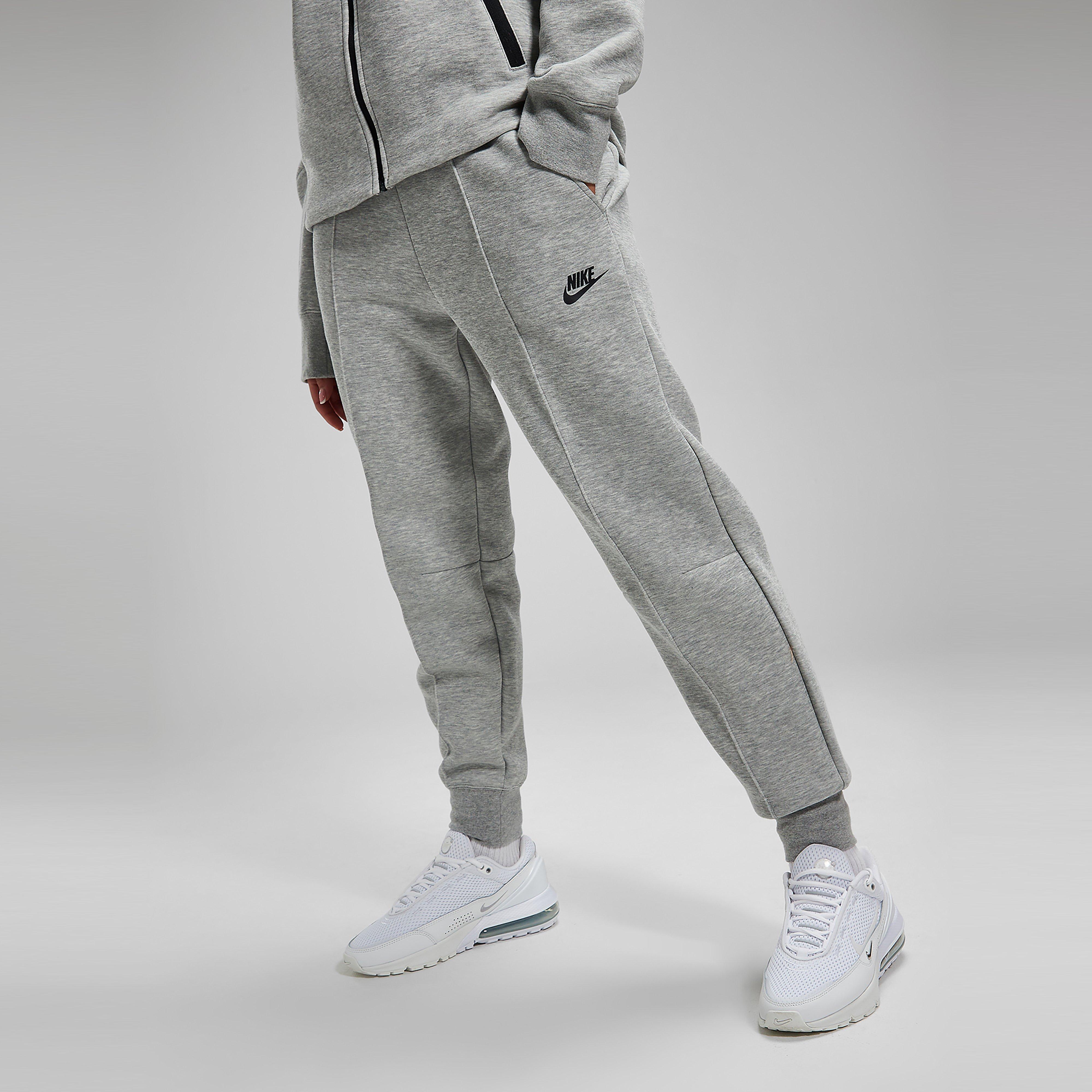 Pantaloni pentru femei NIKE PANTALONI  W NSW TCH FLC MR JGGR