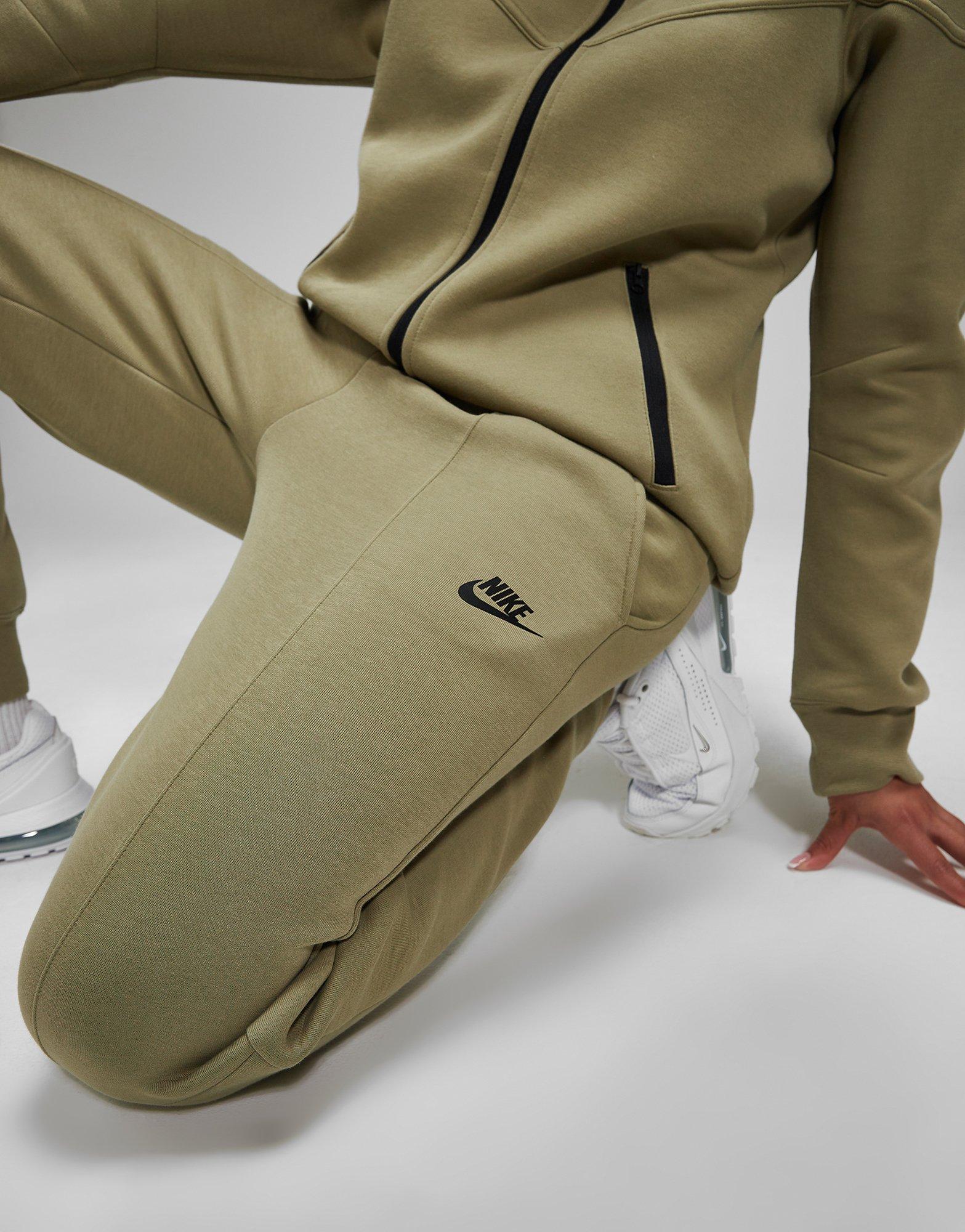 Moteriškos kelnės NIKE KELNĖS W NSW TCH FLC MR JGGR FB8330-276 Rusvai žalsva