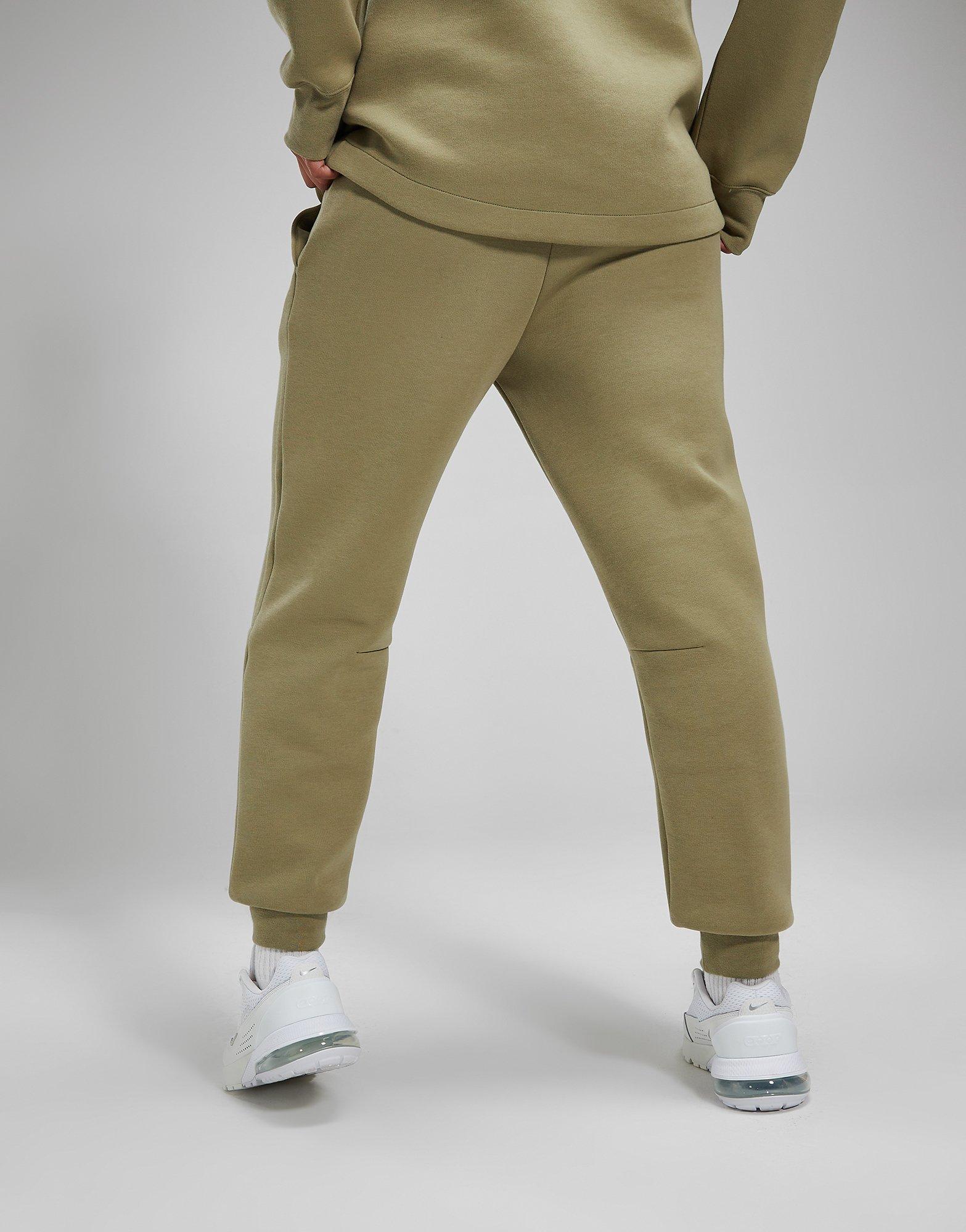 Moteriškos kelnės NIKE KELNĖS W NSW TCH FLC MR JGGR FB8330-276 Rusvai žalsva