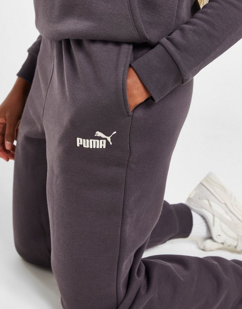 Pantaloni pentru femei PUMA PANTALONI  ESS+ EMBROIDERY HIGH-WAIST PANTS F 67000713 Gri