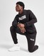 PUMA SPODNIE KEY GRAPHIC PANTS FL