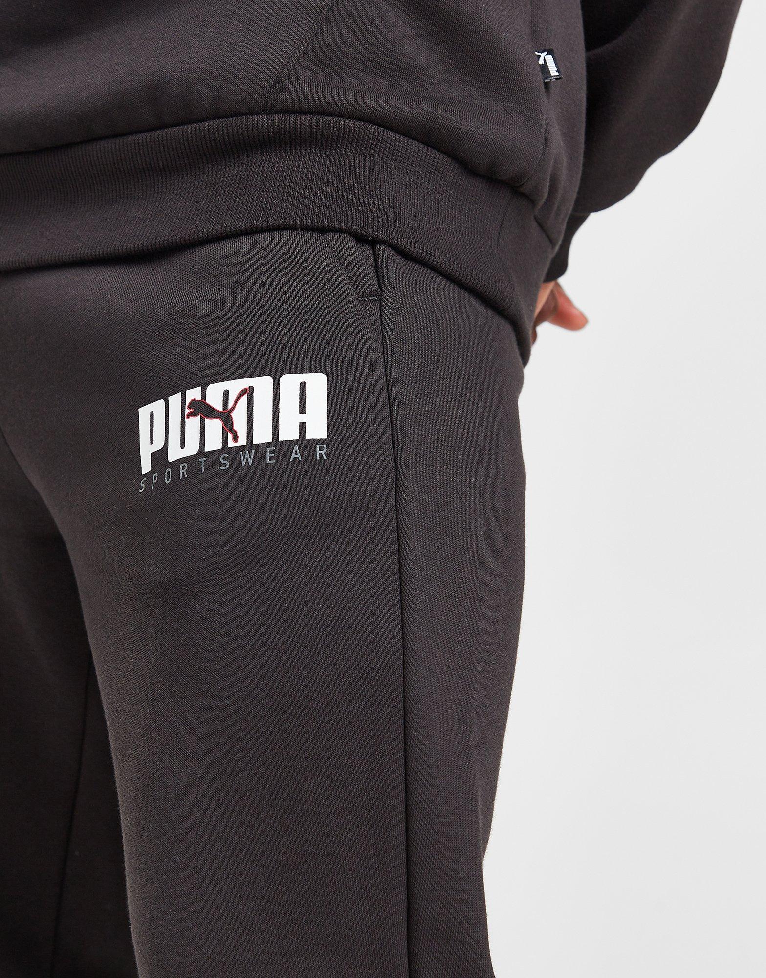 Мъжки панталони PUMA ПАНТАЛОНИ KEY GRAPHIC PANTS FL 62303601 Черен