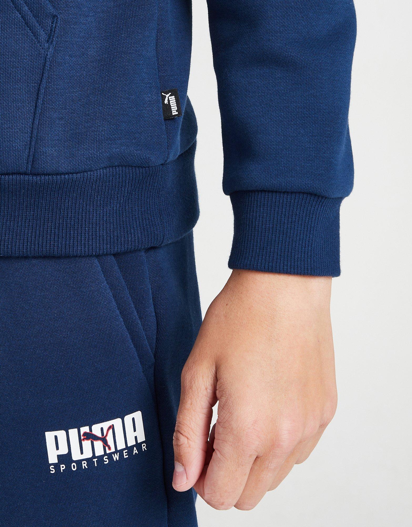 Detská mikina PUMA MIKINA S KAPUCŇOU KEY GRAPHIC HOODIE B FL 67508646 Tmavomodrá