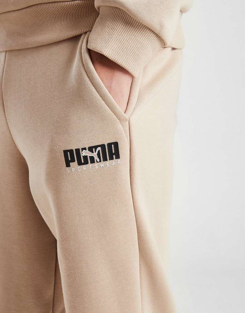 Pantaloni pentru copii PUMA PANTALONI  KEY GRAPHIC PANT B F L 67508830 Bej