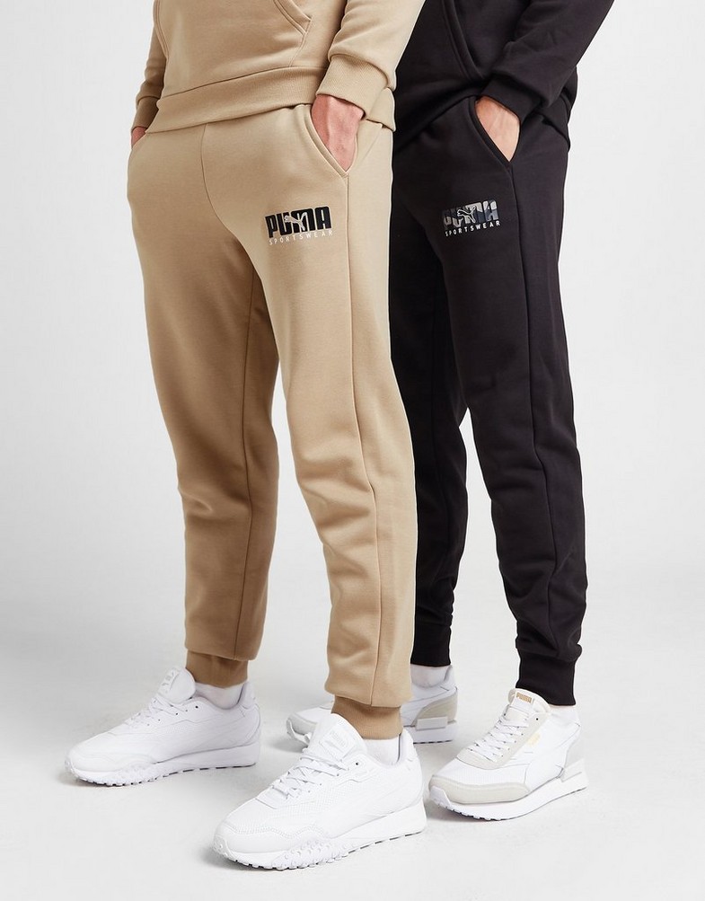 Pantaloni pentru bărbați PUMA PANTALONI  KEY GRAPHIC PANTS FL 62303630 Bej