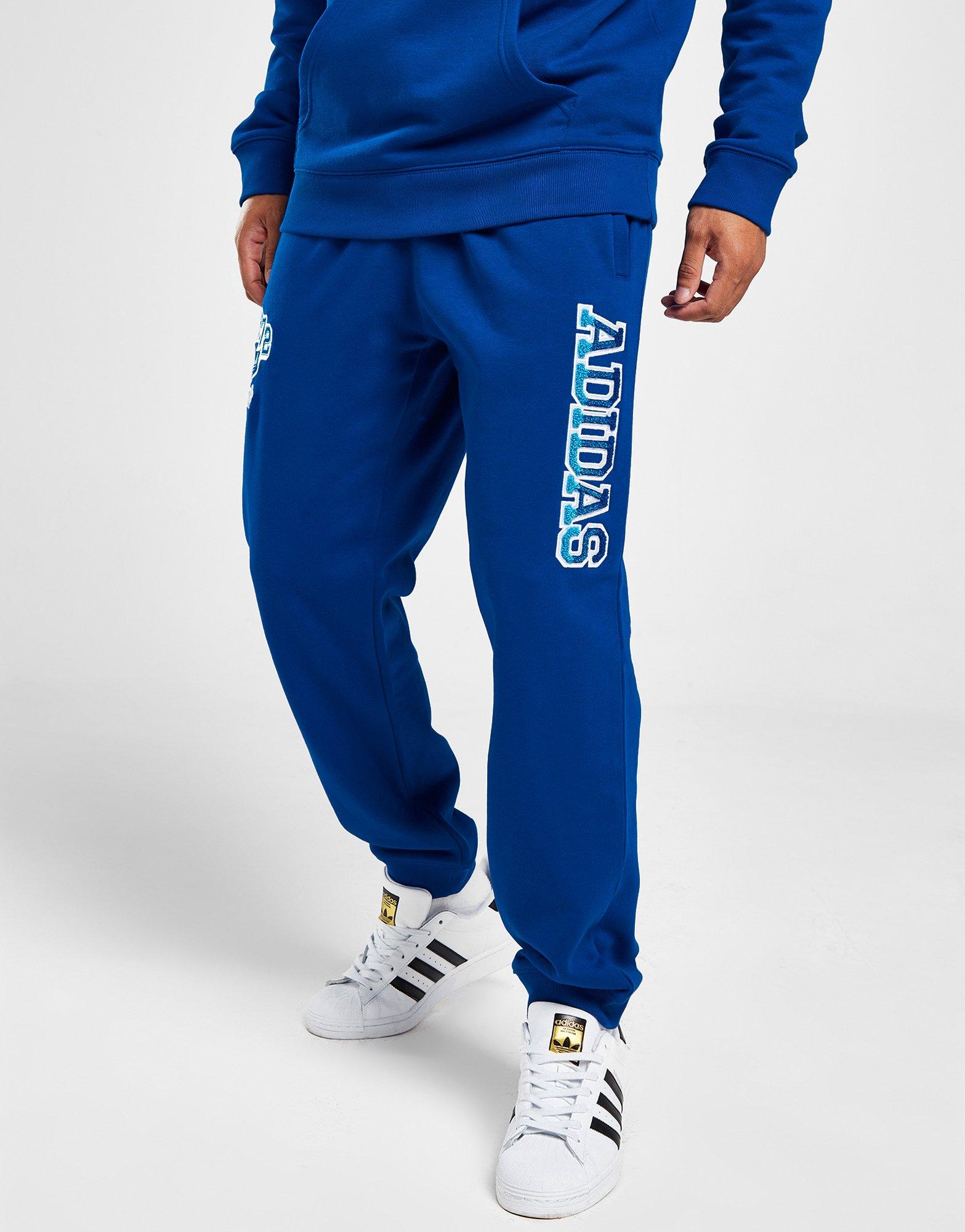 Pánské kalhoty ADIDAS KALHOTY  GRADIENT PANT BLU IR9669 Modrá