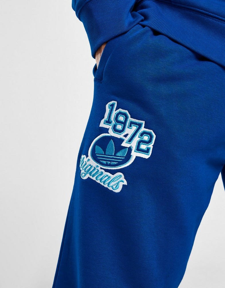 Чоловічі штани ADIDAS ШТАНИ GRADIENT PANT BLU IR9669 Блакитний