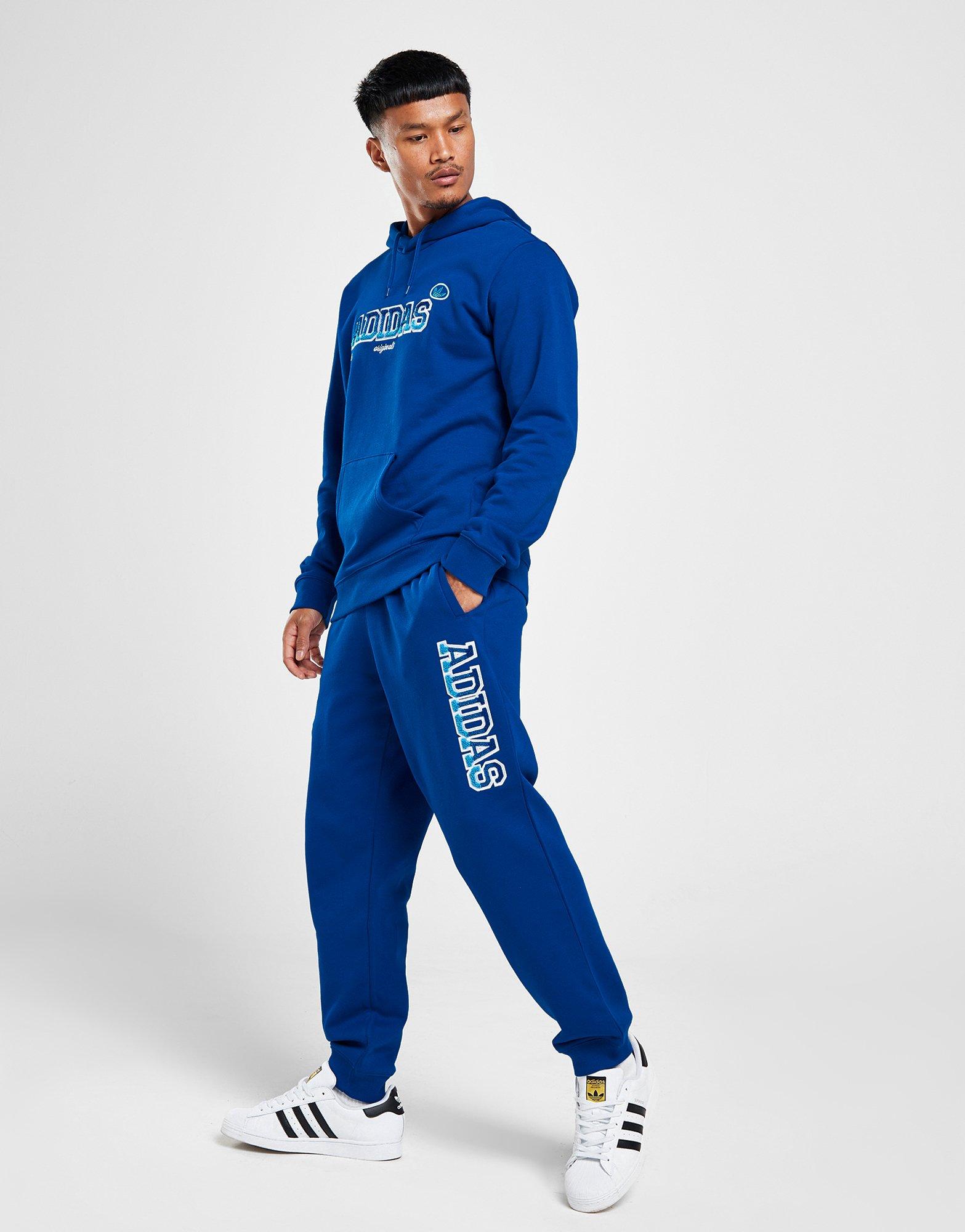 Pánské kalhoty ADIDAS KALHOTY  GRADIENT PANT BLU IR9669 Modrá