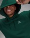 ADIDAS MIKINA S KAPUCÍ TREF ESS HD C.GREEN
