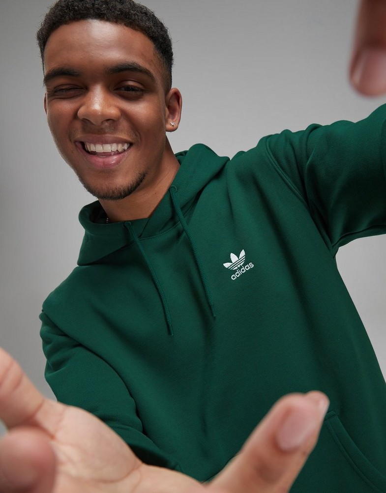 Pánska mikina ADIDAS MIKINA S KAPUCÍ TREF ESS HD C.GREEN IS2247 Zelená