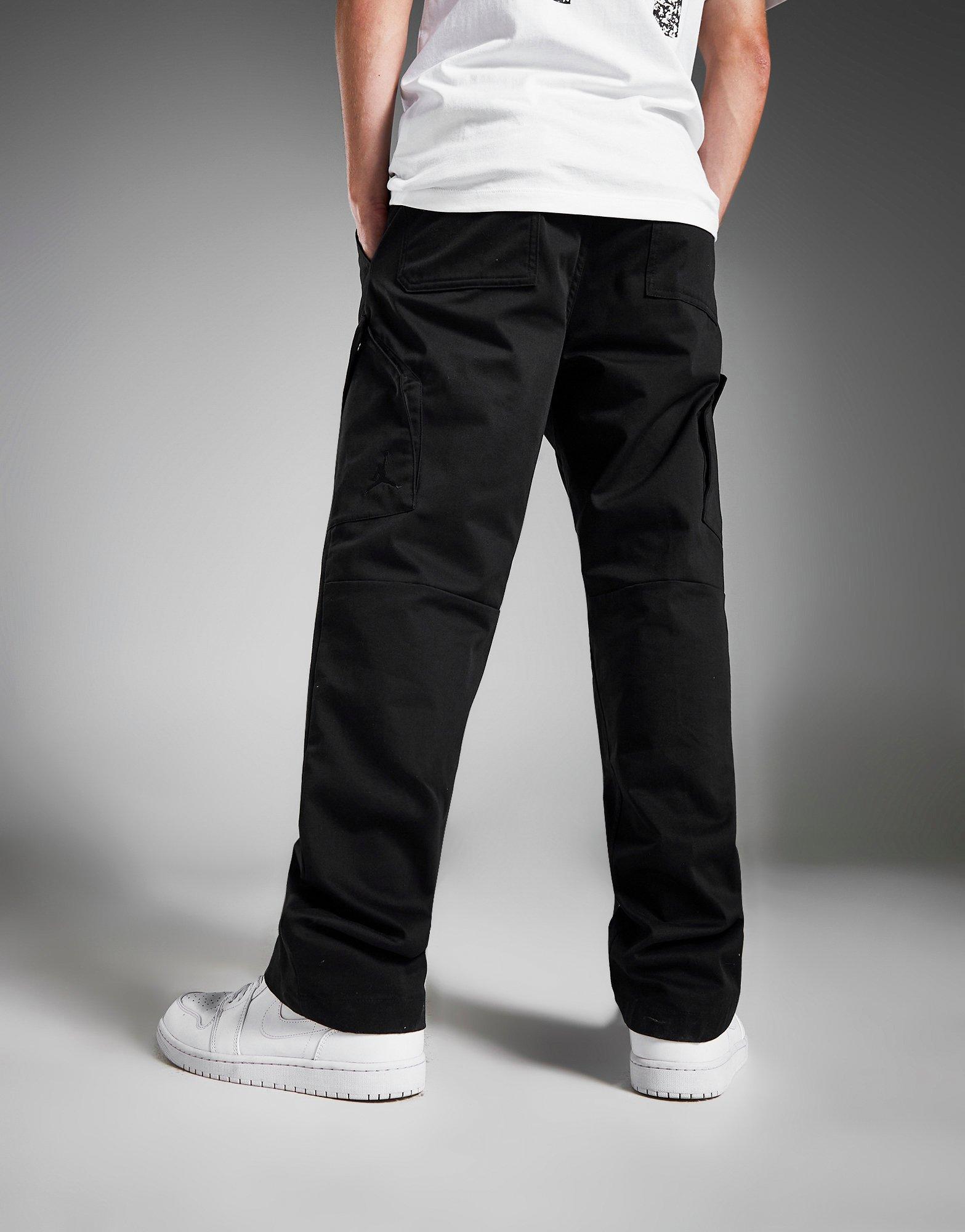 Pantaloni JORDAN PANTALONI M J ESS STMT CHICAGO PANT FB7305 010 B rba i culoare Negru Imbr c minte Jordan originali JD Sports