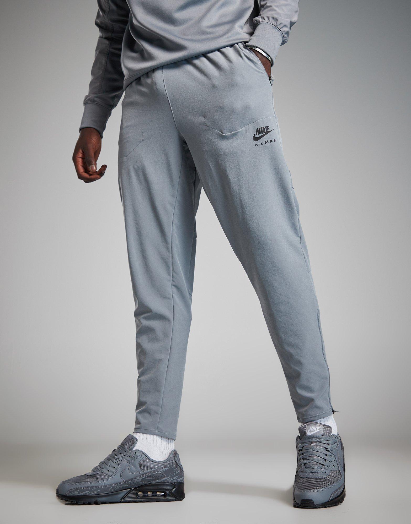 Pantaloni pentru bărbați NIKE PANTALONI  M NSW AIR MAX TC WV PANT FQ2207-065 Gri