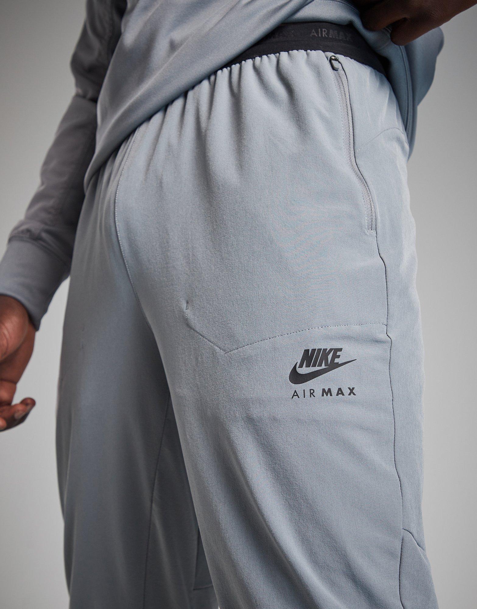 Pantaloni pentru bărbați NIKE PANTALONI  M NSW AIR MAX TC WV PANT FQ2207-065 Gri