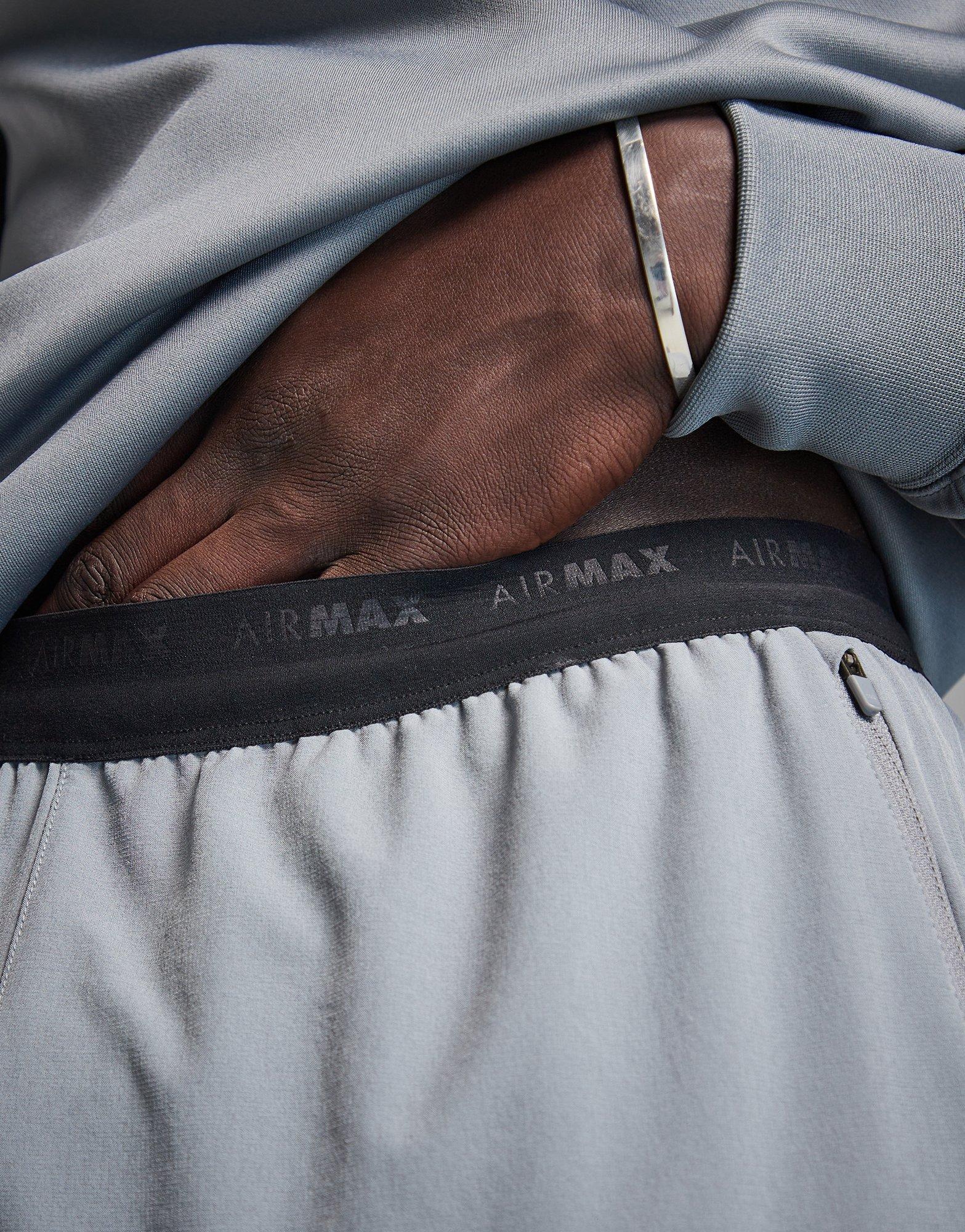 Pantaloni pentru bărbați NIKE PANTALONI  M NSW AIR MAX TC WV PANT FQ2207-065 Gri