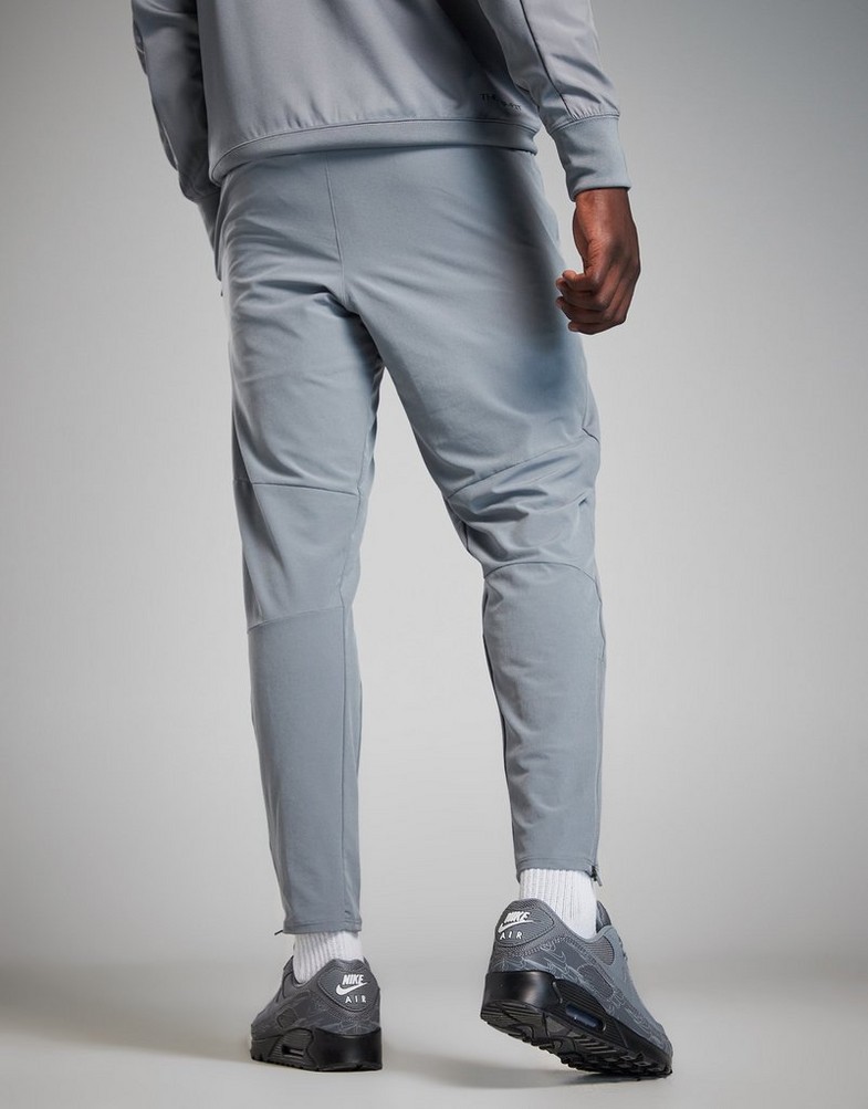 Чоловічі штани NIKE ШТАНИ M NSW AIR MAX TC WV PANT FQ2207-065 Сірий