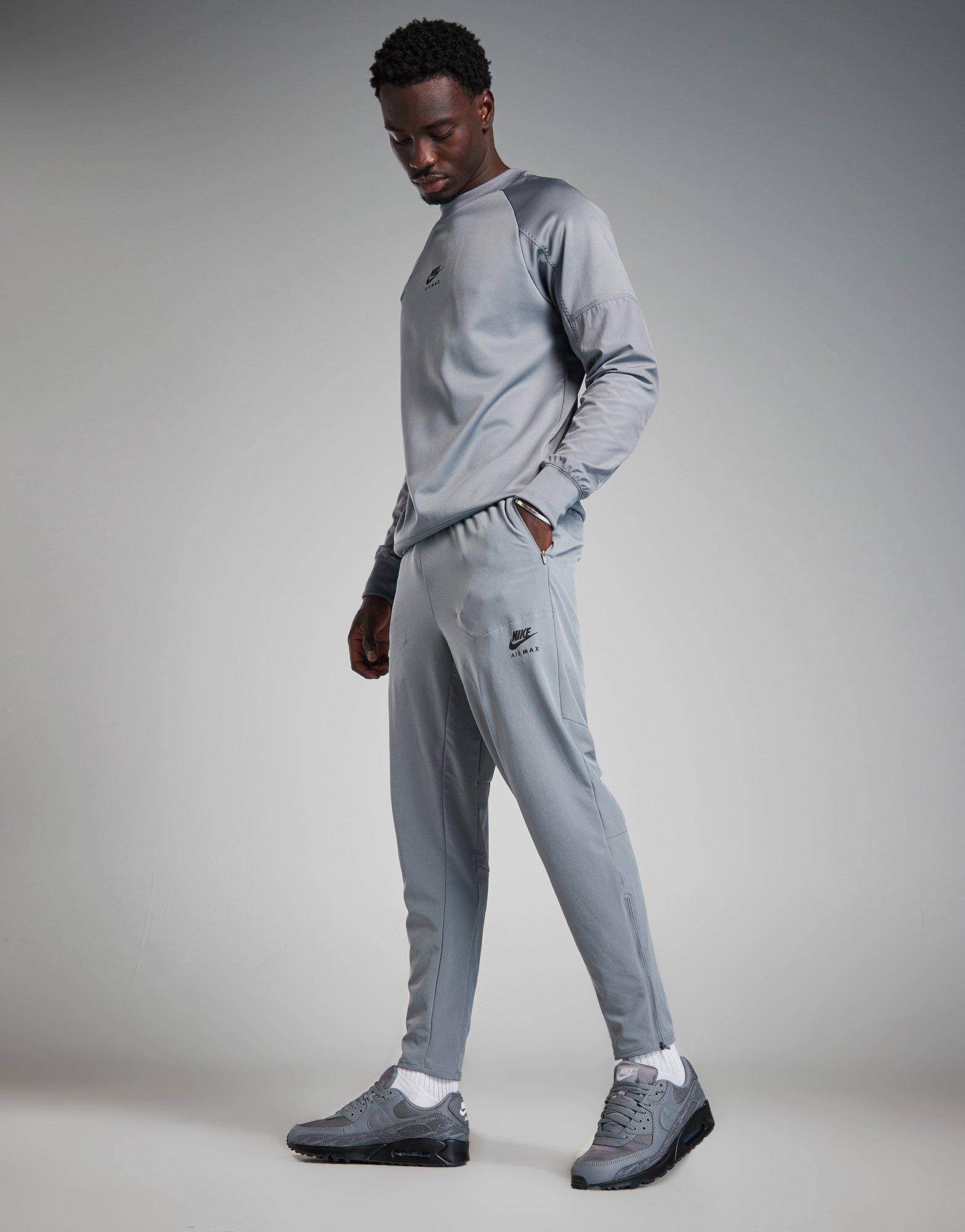 Pantaloni pentru bărbați NIKE PANTALONI  M NSW AIR MAX TC WV PANT FQ2207-065 Gri