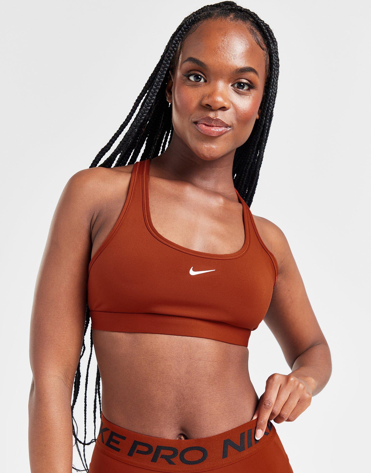 Moteriška sportinė liemenėlė NIKE BRA NK SWSH LGT SPT BRA DX6817-832 Ruda
